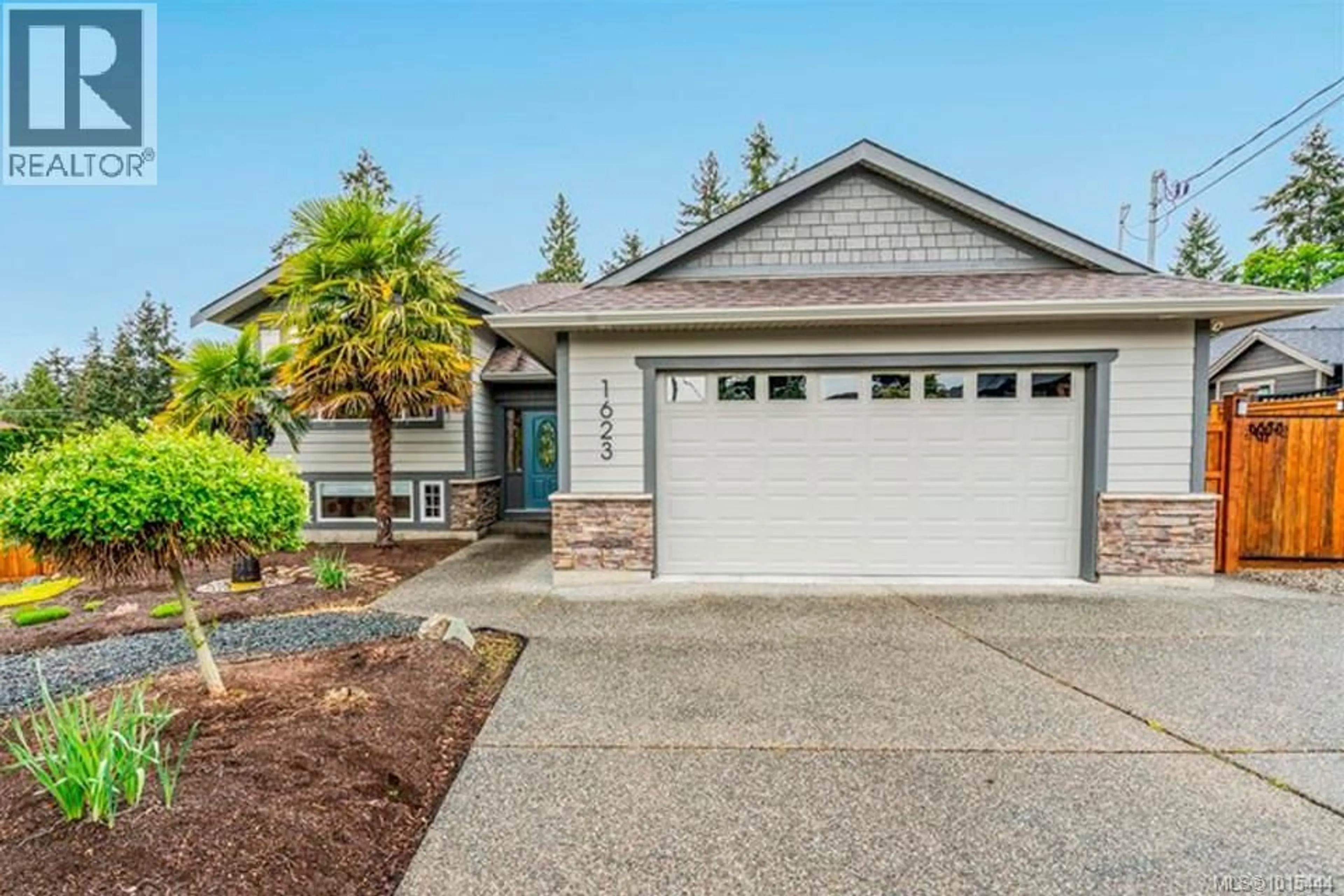 Home with vinyl exterior material, street for 1623 STONE LAKE DRIVE, Nanoose Bay British Columbia V9P9L1