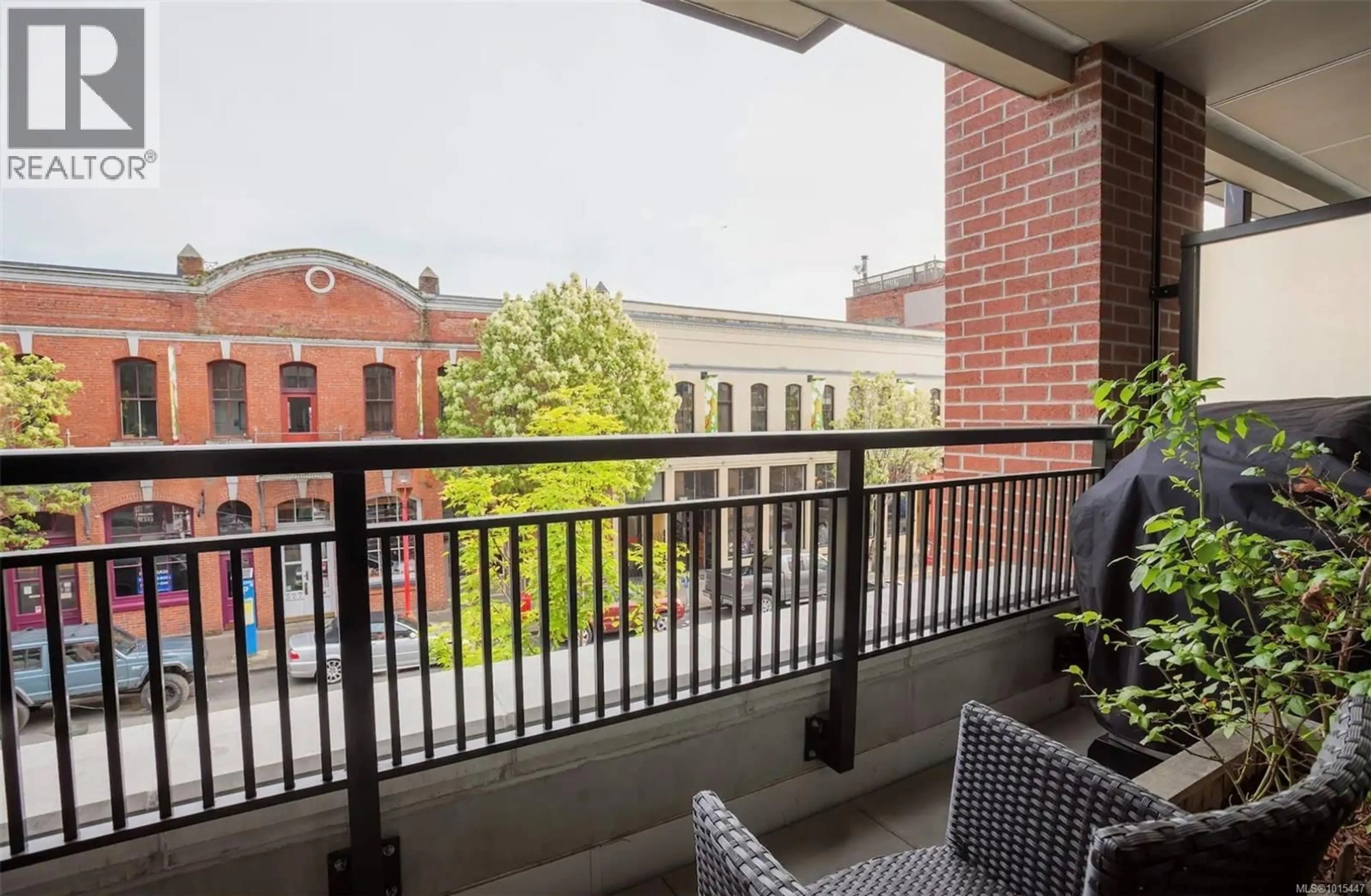 Balcony in the apartment, city buildings view from balcony for 212 - 528 PANDORA AVENUE, Victoria British Columbia V8W0C6