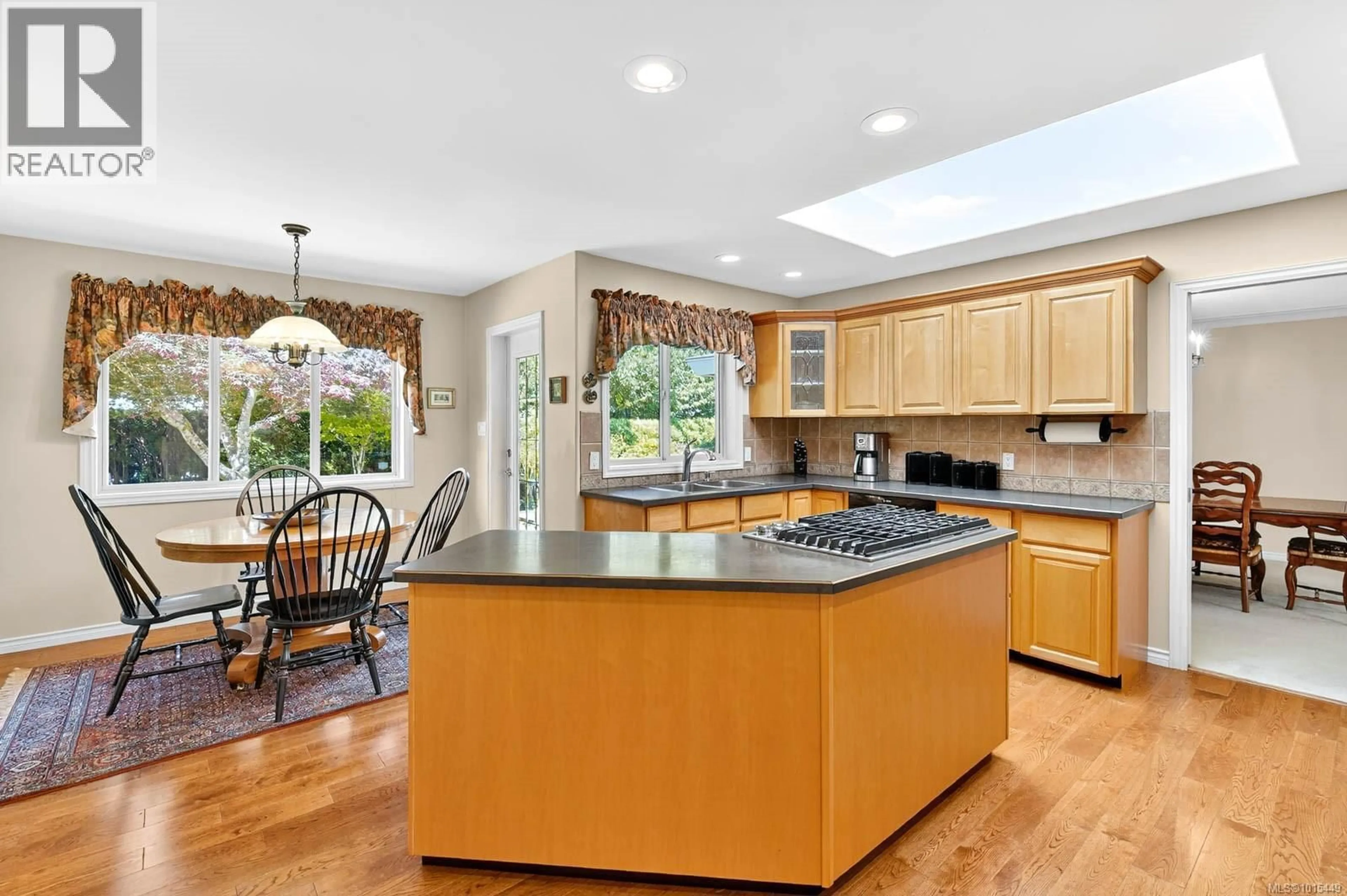 Open concept kitchen, ceramic/tile floor for 5528 WOODLAND CRESCENT WEST, Port Alberni British Columbia V9Y8E6
