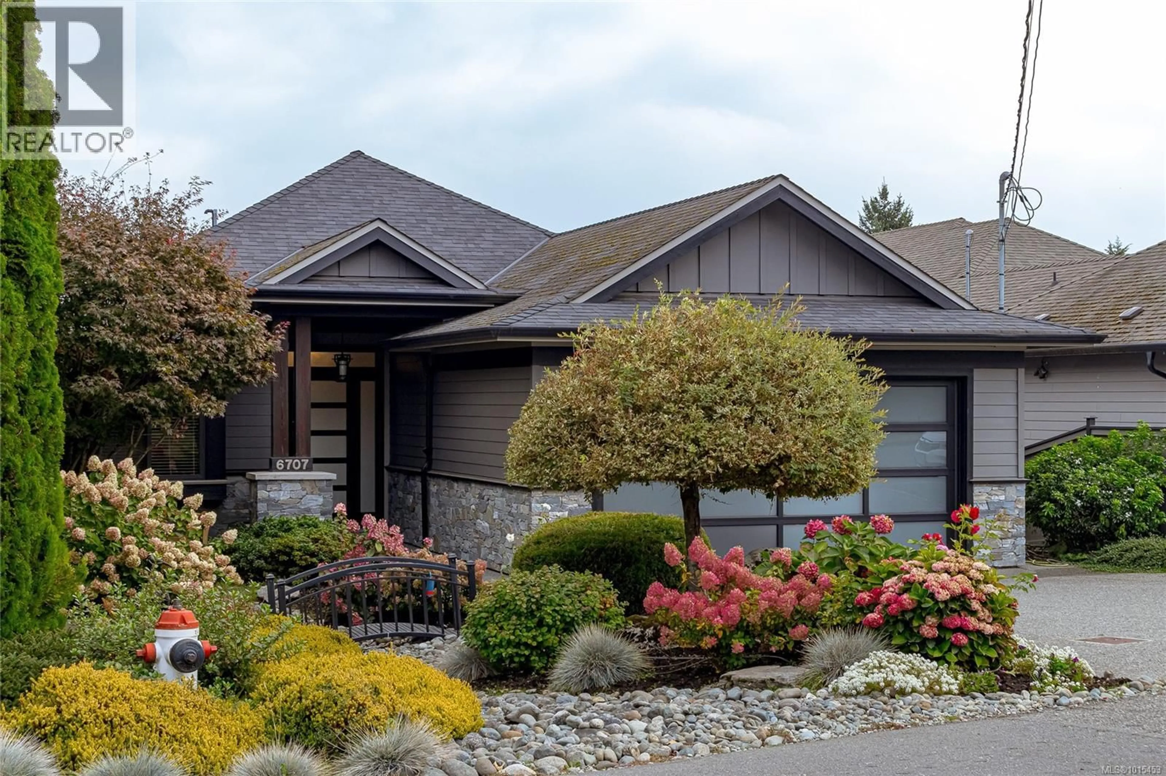 Home with vinyl exterior material, street for 6707 TAMANY DRIVE, Central Saanich British Columbia V8Z5Y8