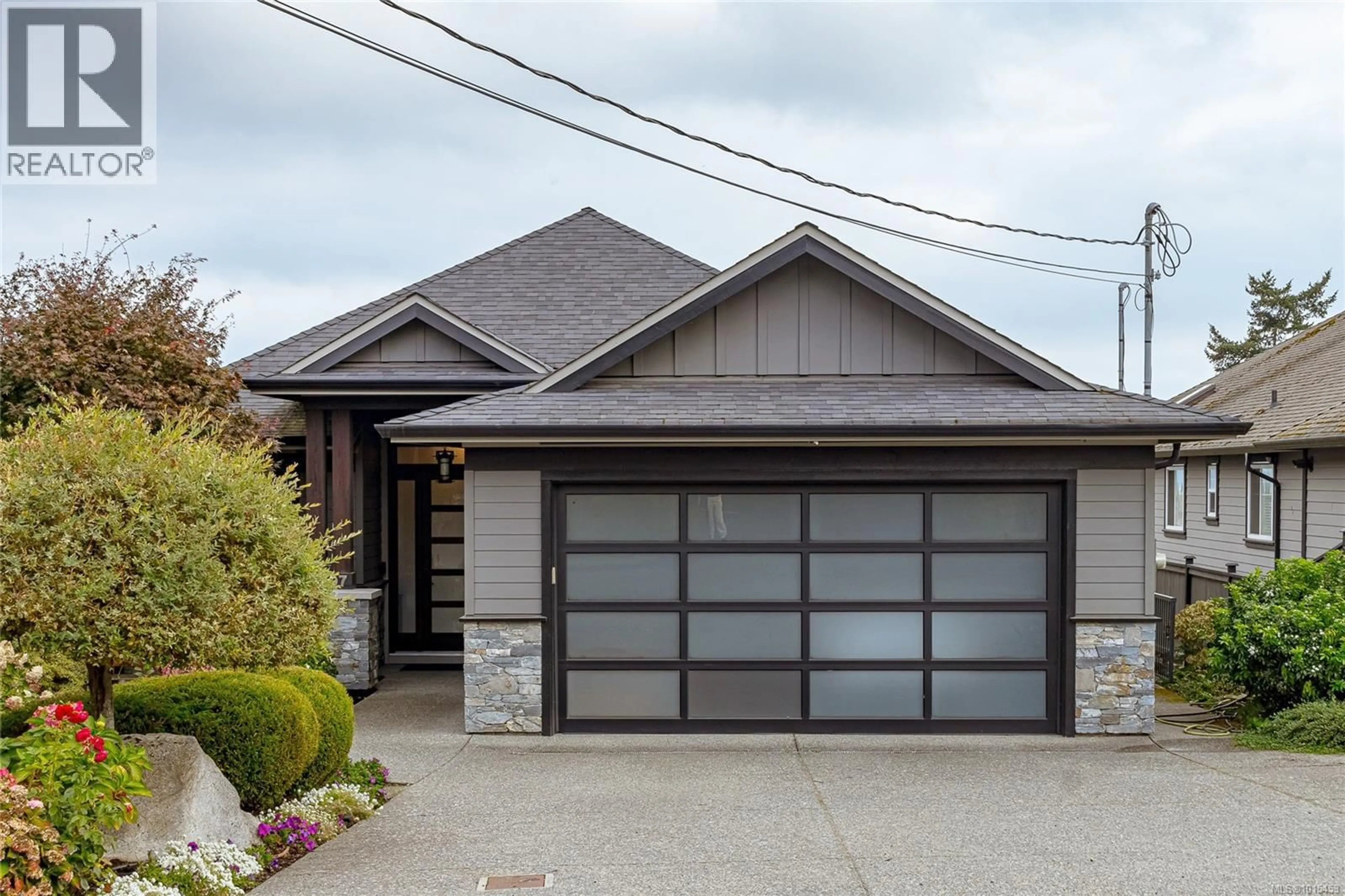 Home with brick exterior material, street for 6707 TAMANY DRIVE, Central Saanich British Columbia V8Z5Y8