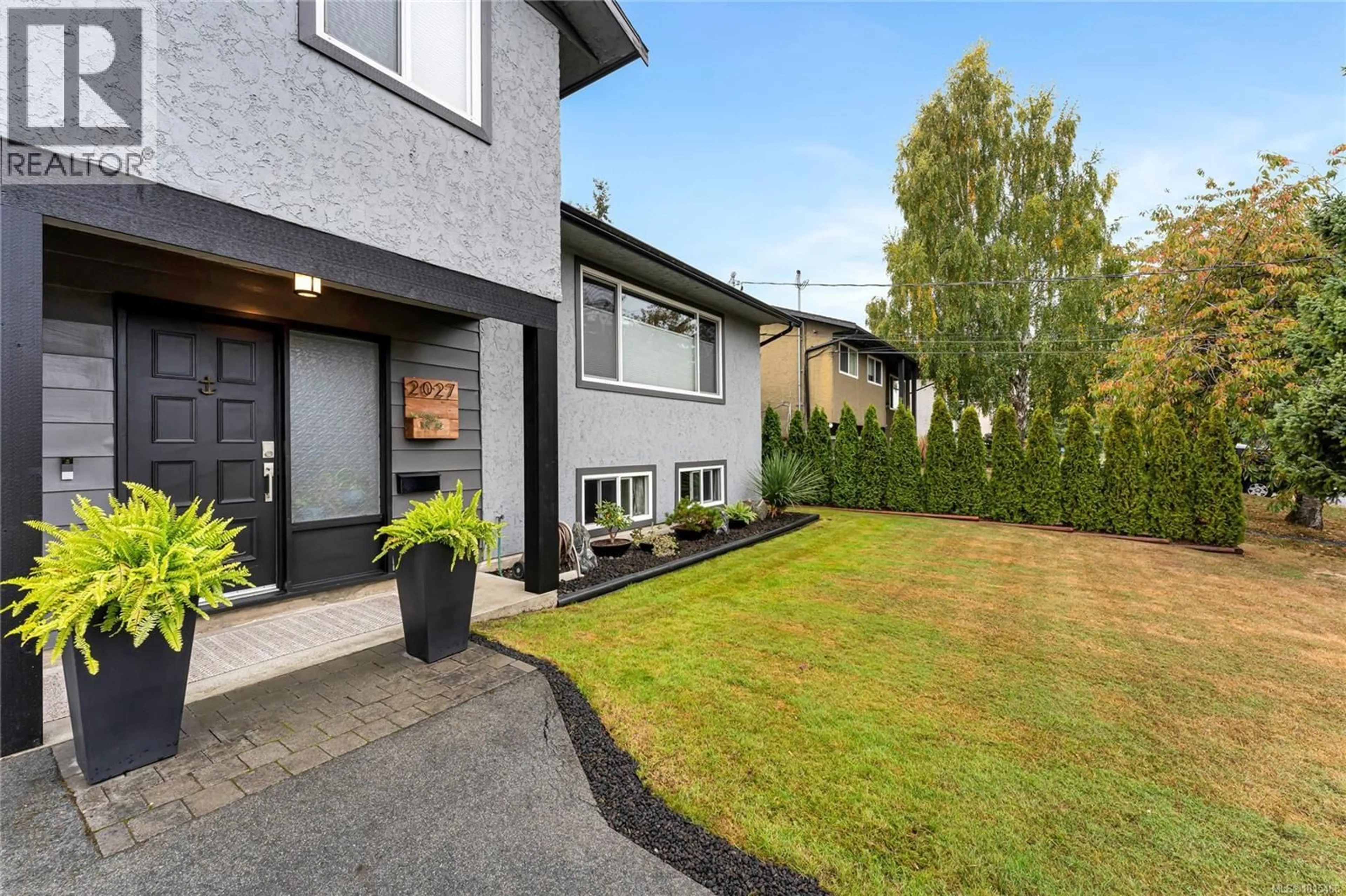 Home with brick exterior material, street for 2027 ARDWELL AVENUE, Sidney British Columbia V8L2L6