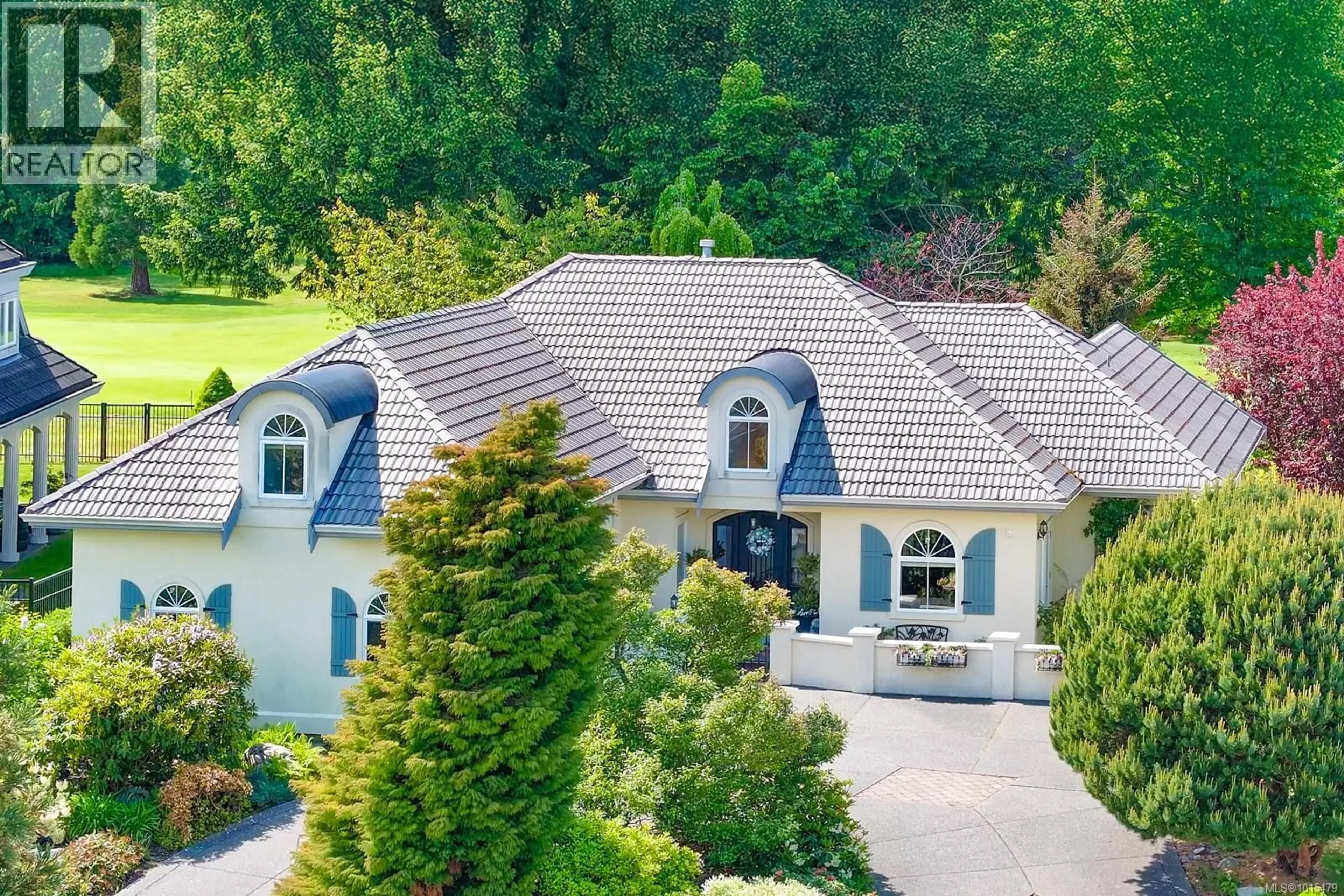 A pic from outside/outdoor area/front of a property/back of a property/a pic from drone, mountain view for 3274 MAJESTIC DRIVE, Courtenay British Columbia V9N9X4