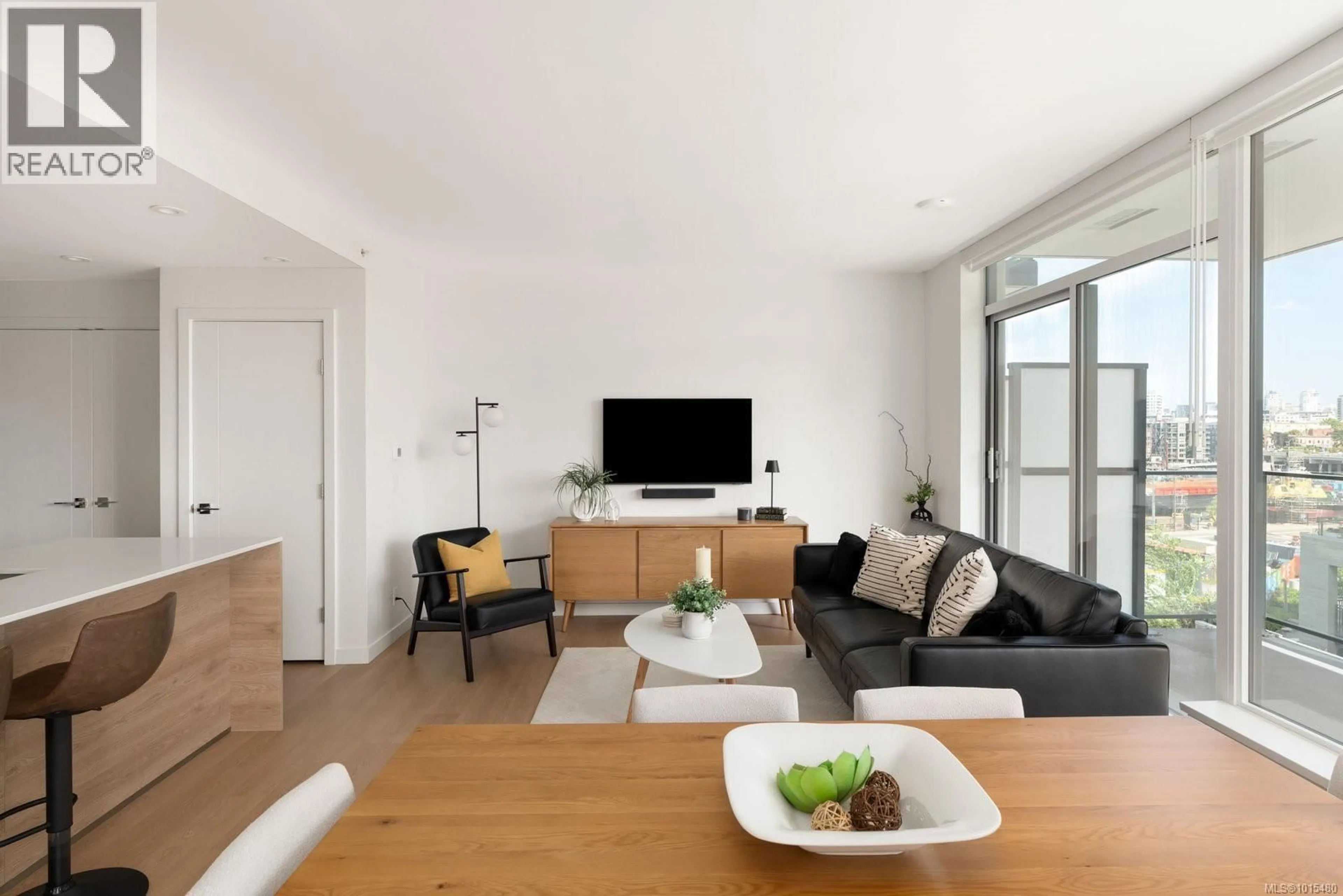 Living room with furniture, unknown for 402 - 363 TYEE ROAD, Victoria British Columbia V9A0B5