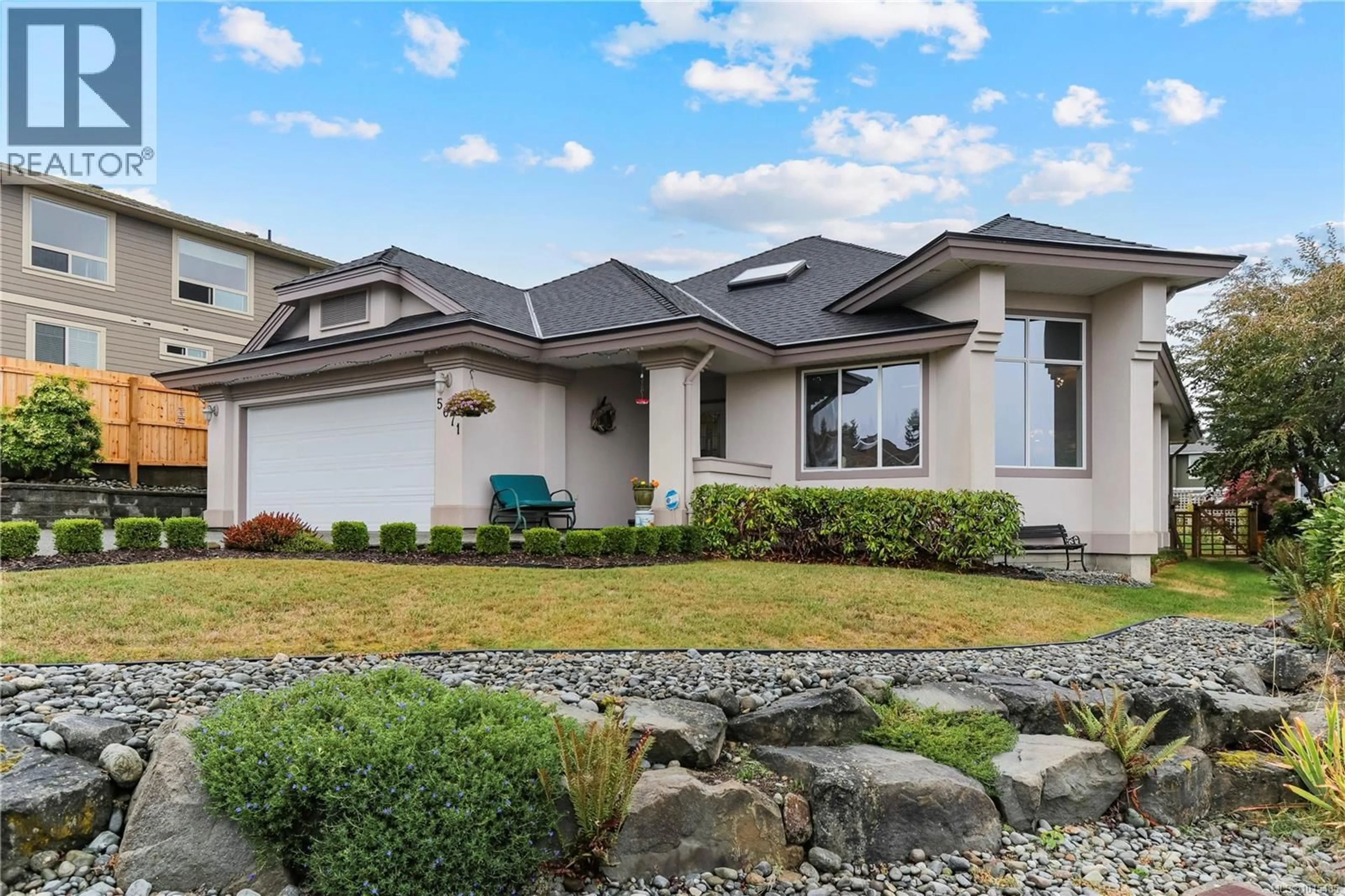 Home with vinyl exterior material, street for 5671 MUGGIES WAY, Nanaimo British Columbia V9V1W2