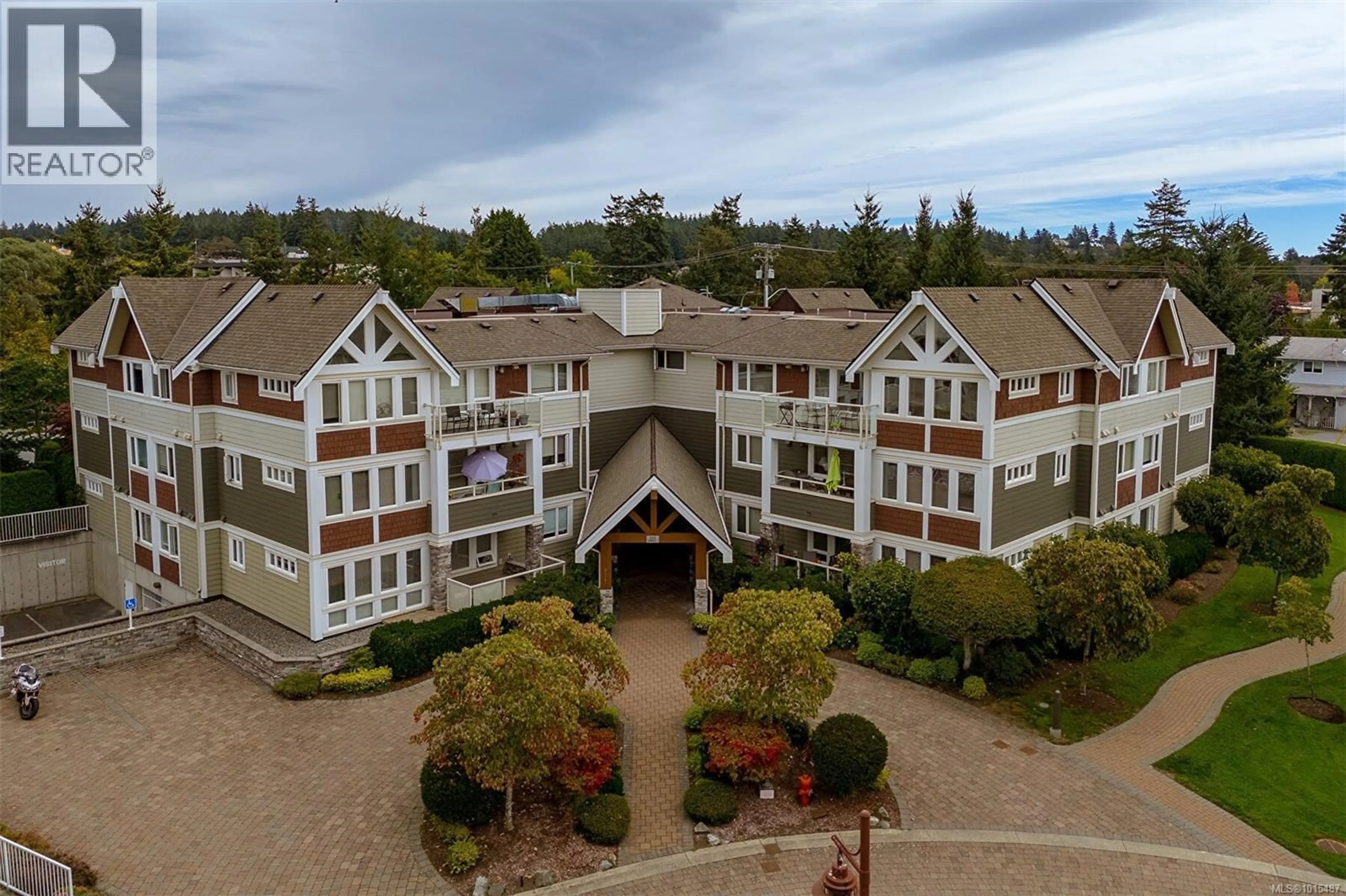 A pic from outside/outdoor area/front of a property/back of a property/a pic from drone, mountain view for 302 - 535 HEATHERDALE LANE, Saanich British Columbia V8Z0A4