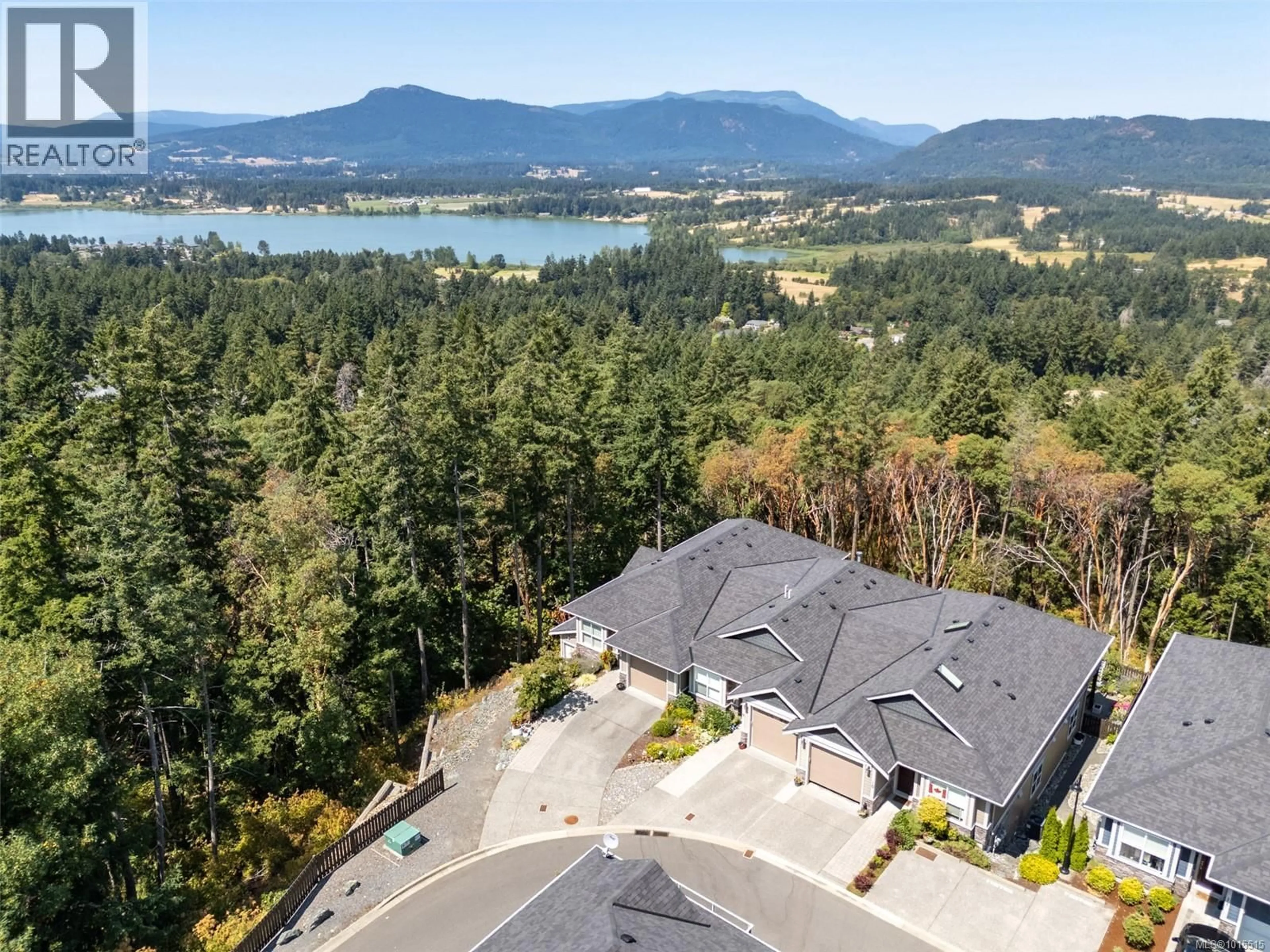A pic from outside/outdoor area/front of a property/back of a property/a pic from drone, water/lake/river/ocean view for 8 - 1295 KINGSVIEW ROAD, Duncan British Columbia V9L0B3