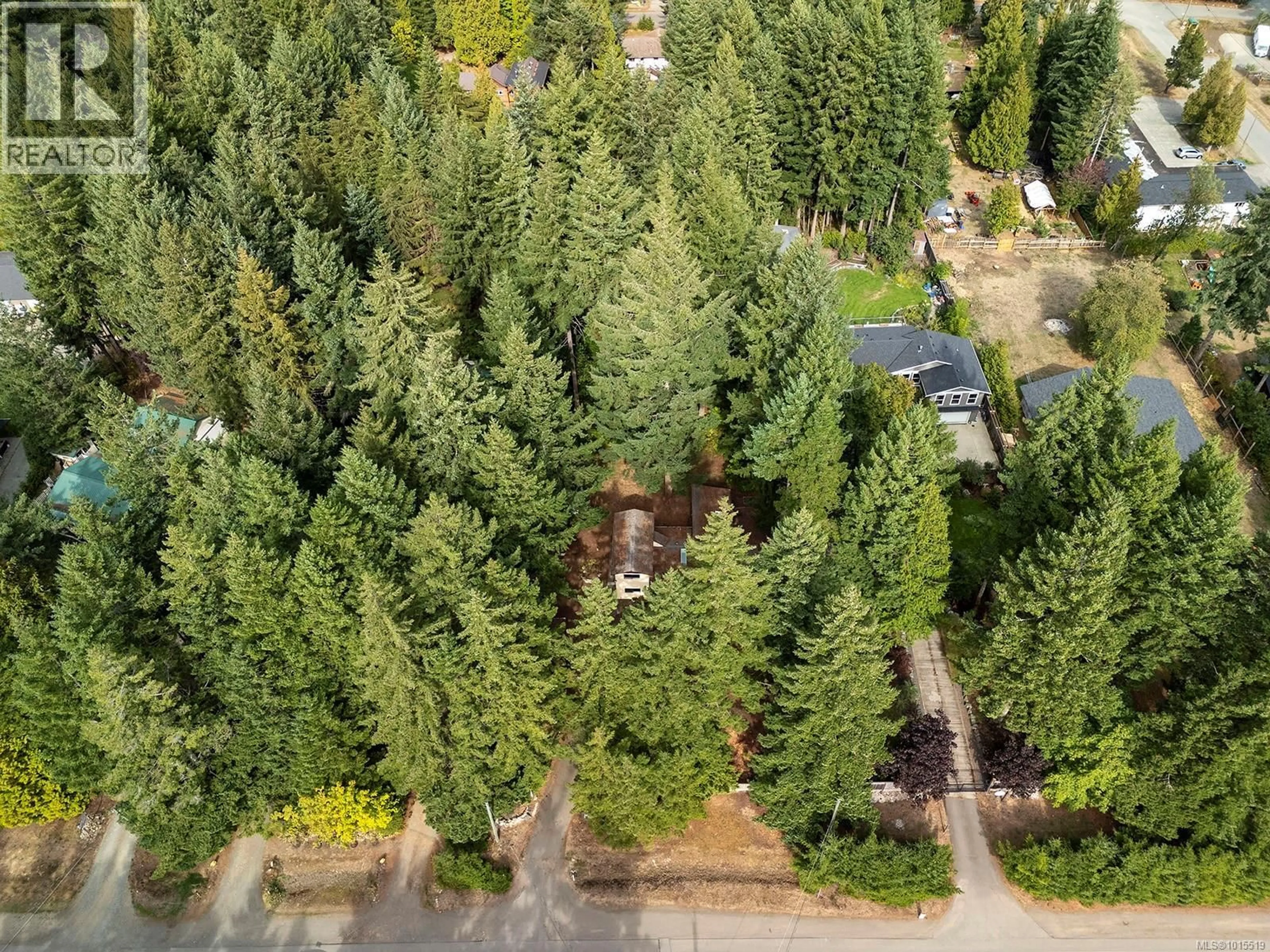 A pic from outside/outdoor area/front of a property/back of a property/a pic from drone, forest/trees view for 1912 RYAN ROAD EAST, Comox British Columbia V9M4C9