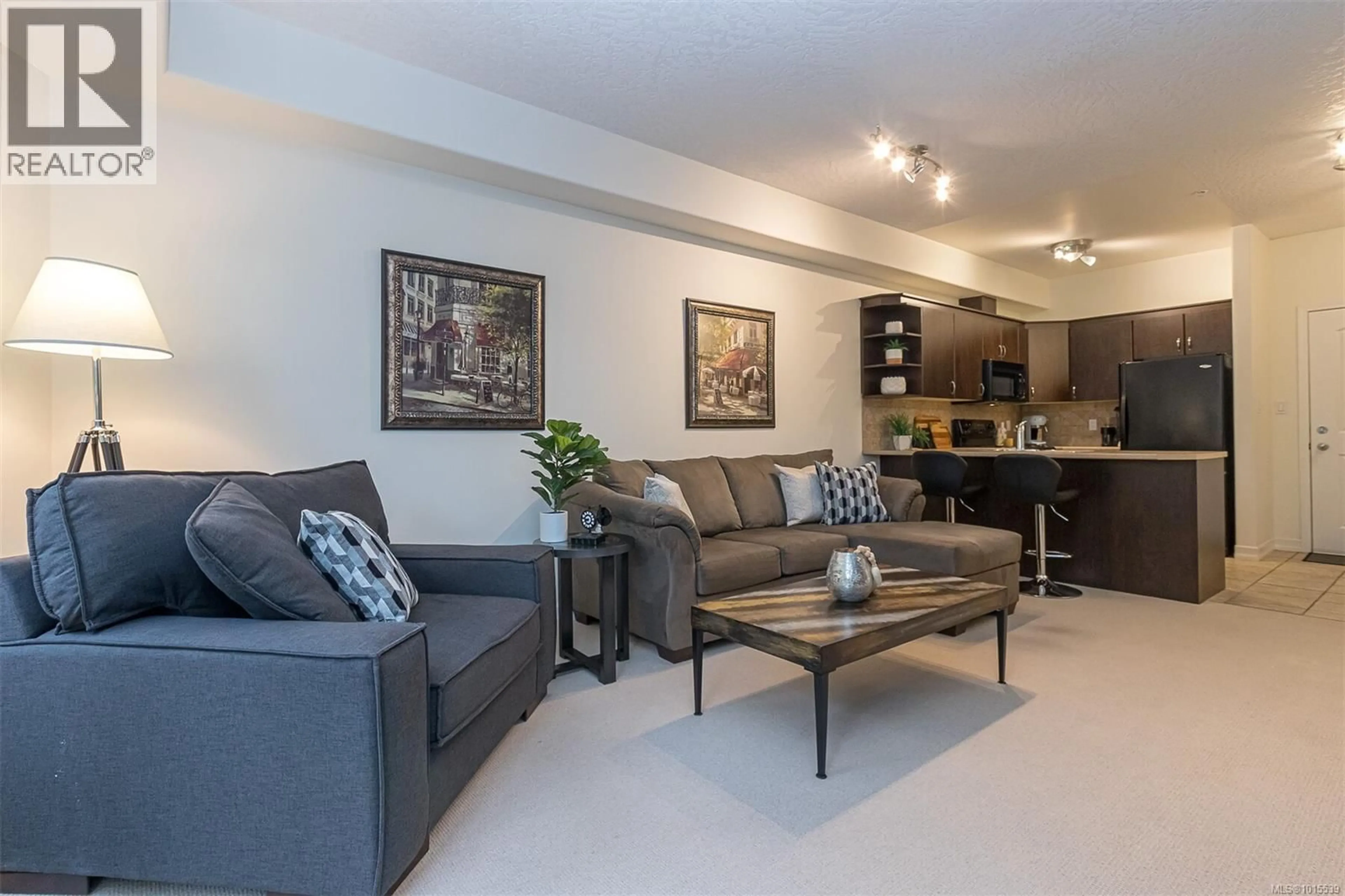 Living room with furniture, unknown for 107 - 3915 CAREY ROAD, Saanich British Columbia V8Z4E3