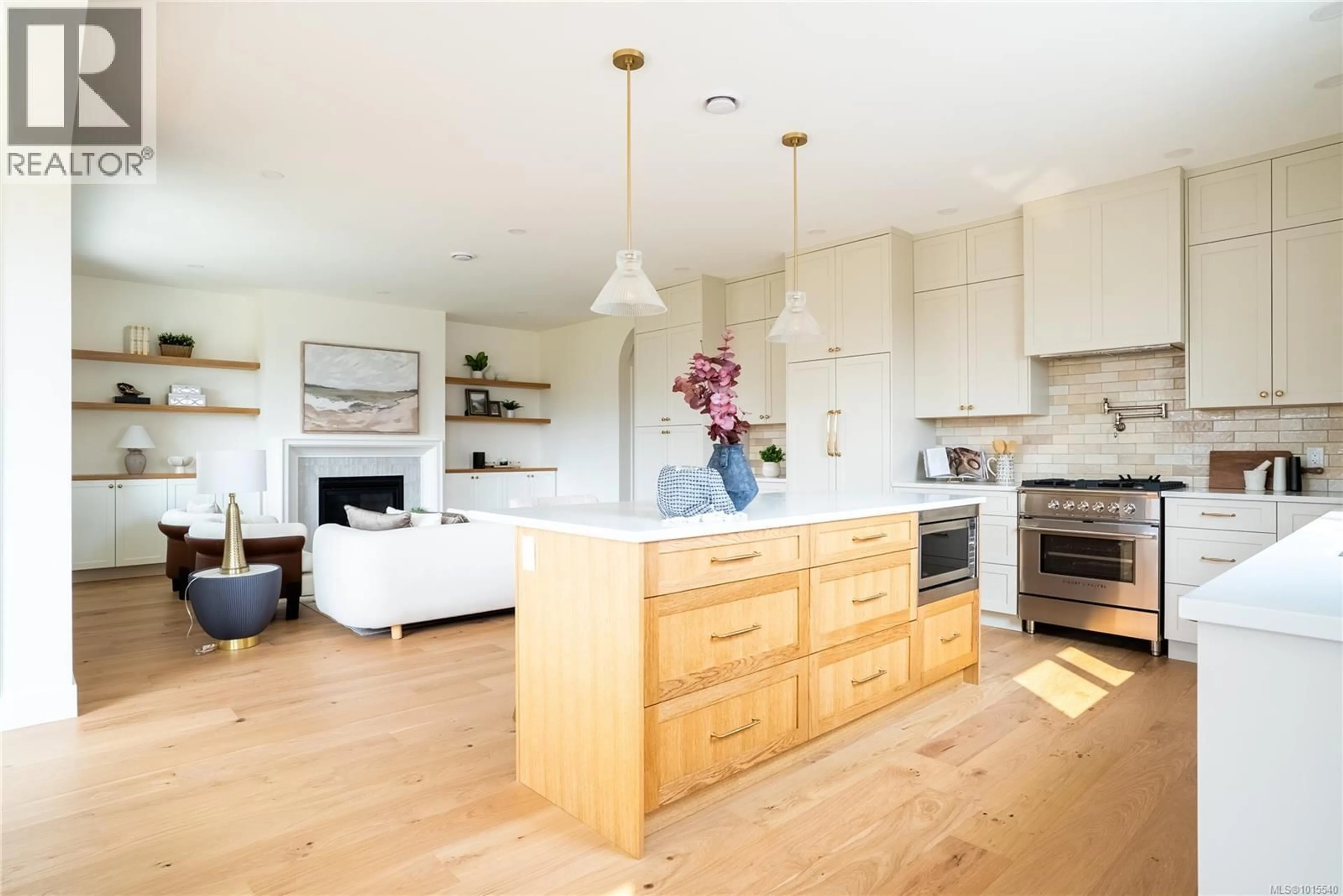 Open concept kitchen, wood/laminate floor for 665 MADRONA PLACE, Langford British Columbia V9B6C6