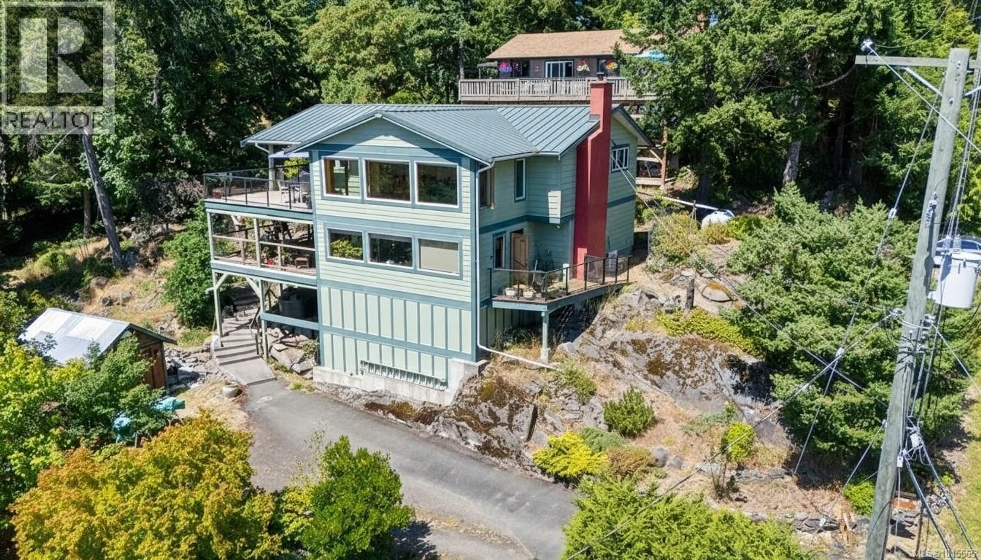 A pic from outside/outdoor area/front of a property/back of a property/a pic from drone, water/lake/river/ocean view for 3705 SIGNAL HILL ROAD, Pender Island British Columbia V0N2M0