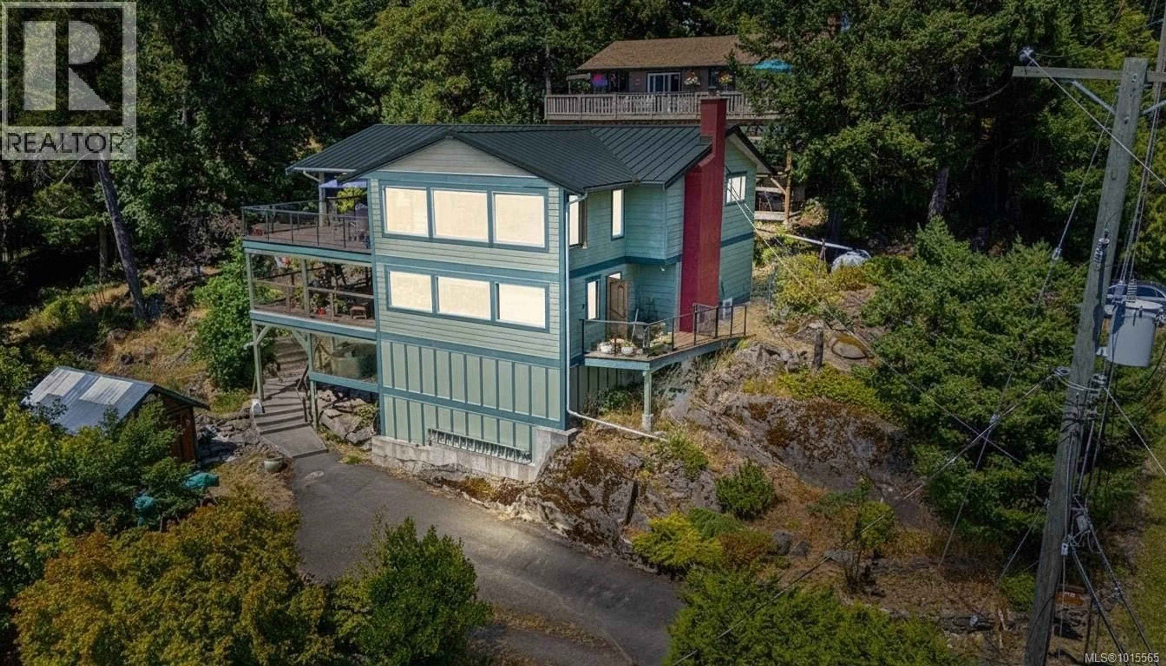 A pic from outside/outdoor area/front of a property/back of a property/a pic from drone, building for 3705 SIGNAL HILL ROAD, Pender Island British Columbia V0N2M0