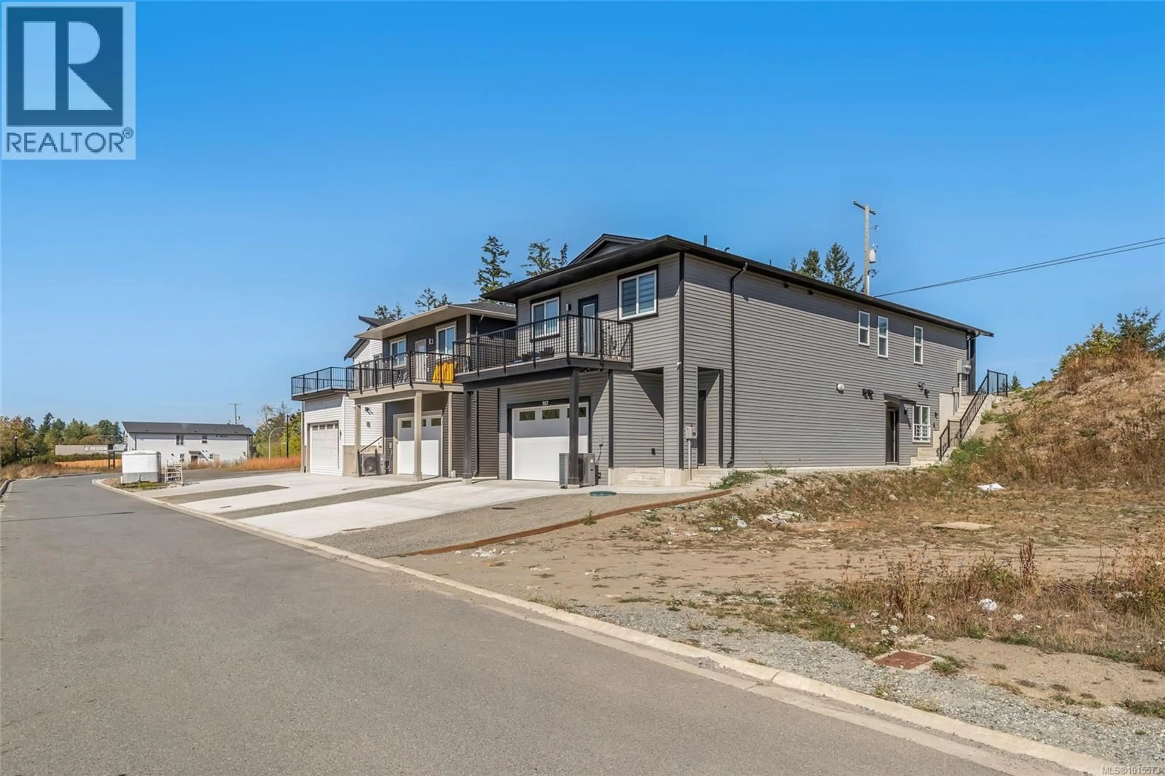 A pic from outside/outdoor area/front of a property/back of a property/a pic from drone, unknown for 917 OLD VICTORIA ROAD, Nanaimo British Columbia V9R0L3