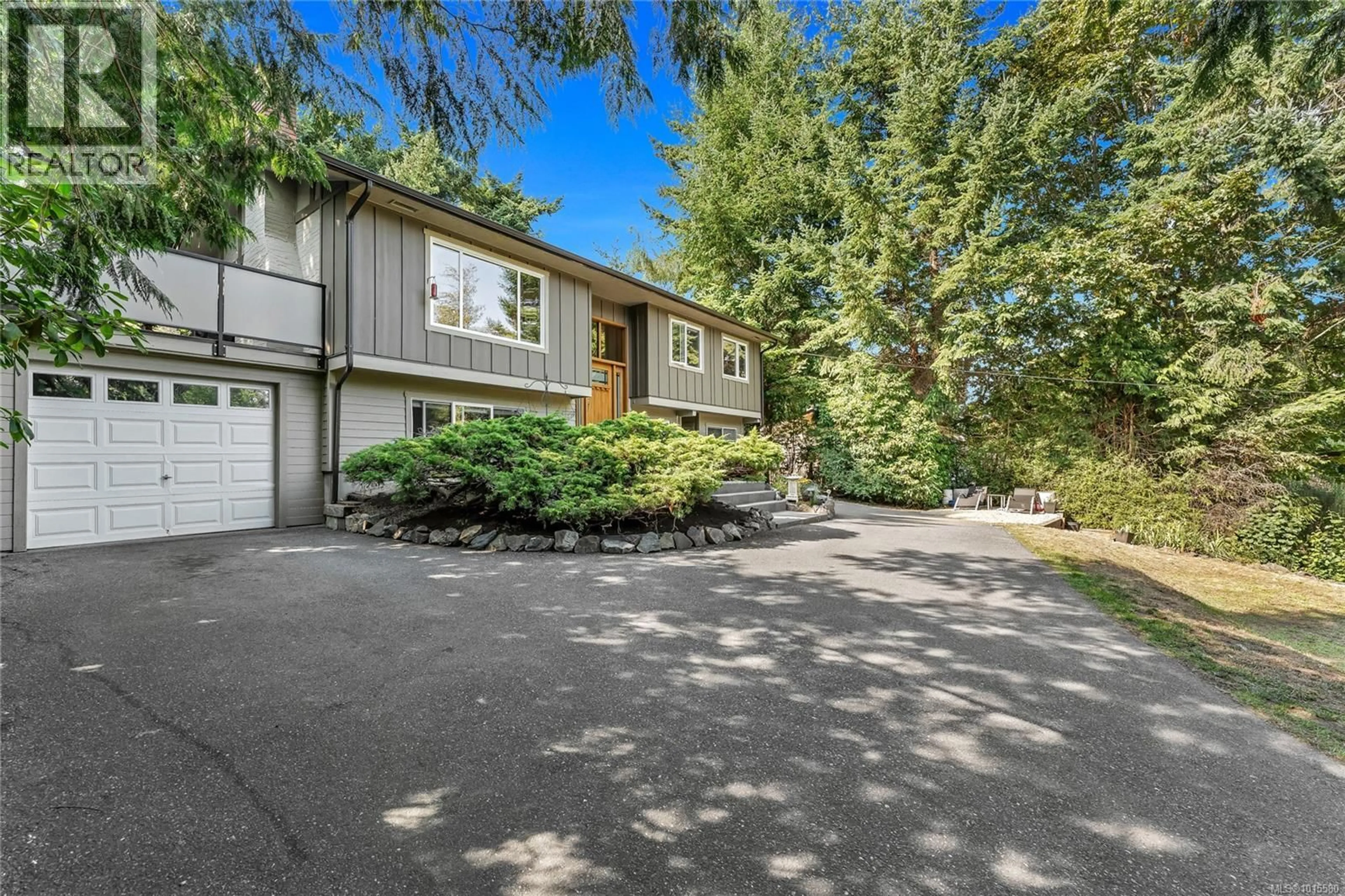 A pic from outside/outdoor area/front of a property/back of a property/a pic from drone, street for 5222 BECKTON ROAD, Saanich British Columbia V8Y2C1