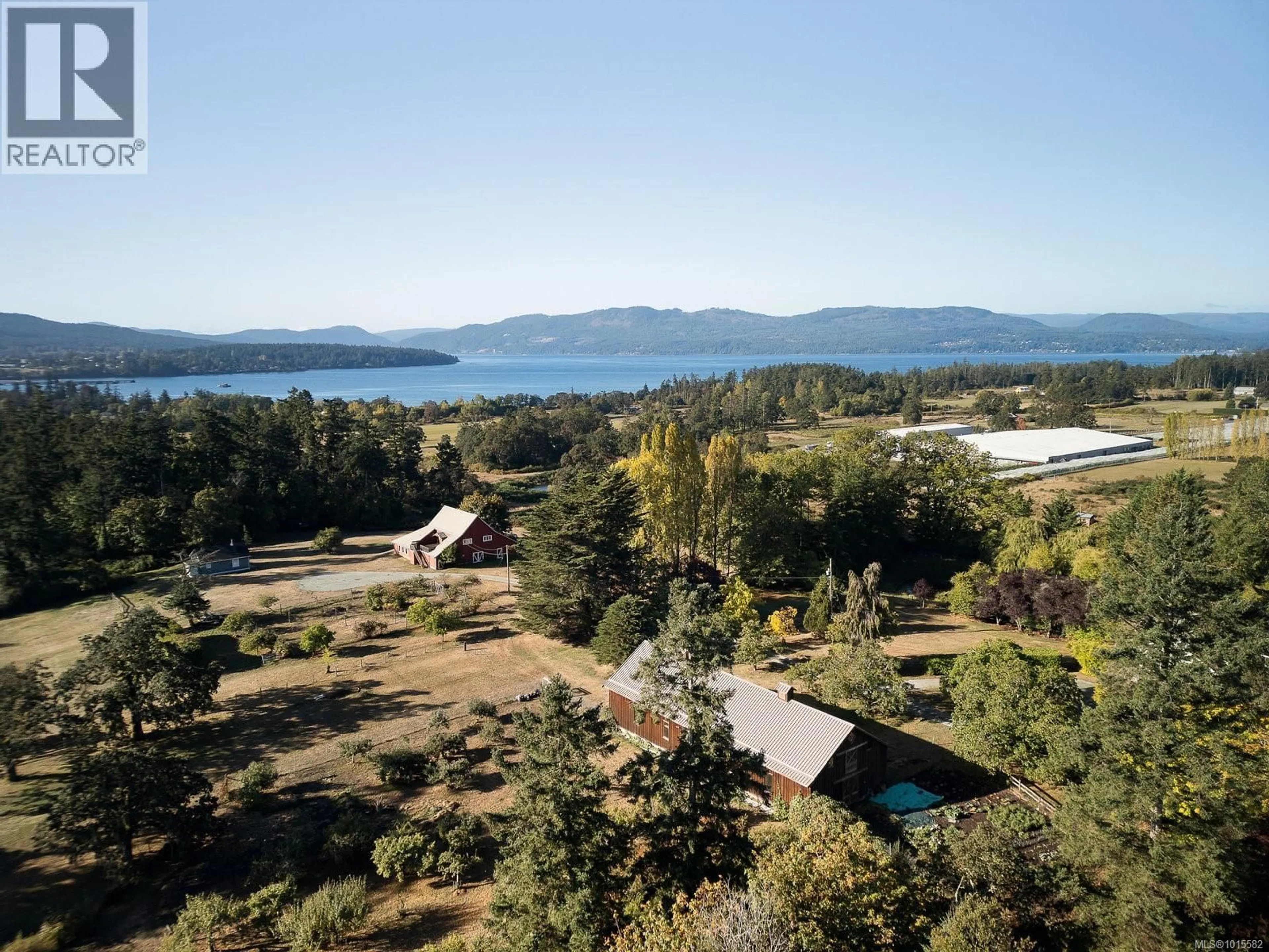 A pic from outside/outdoor area/front of a property/back of a property/a pic from drone, water/lake/river/ocean view for 1175 WAIN ROAD, North Saanich British Columbia V8L5V1