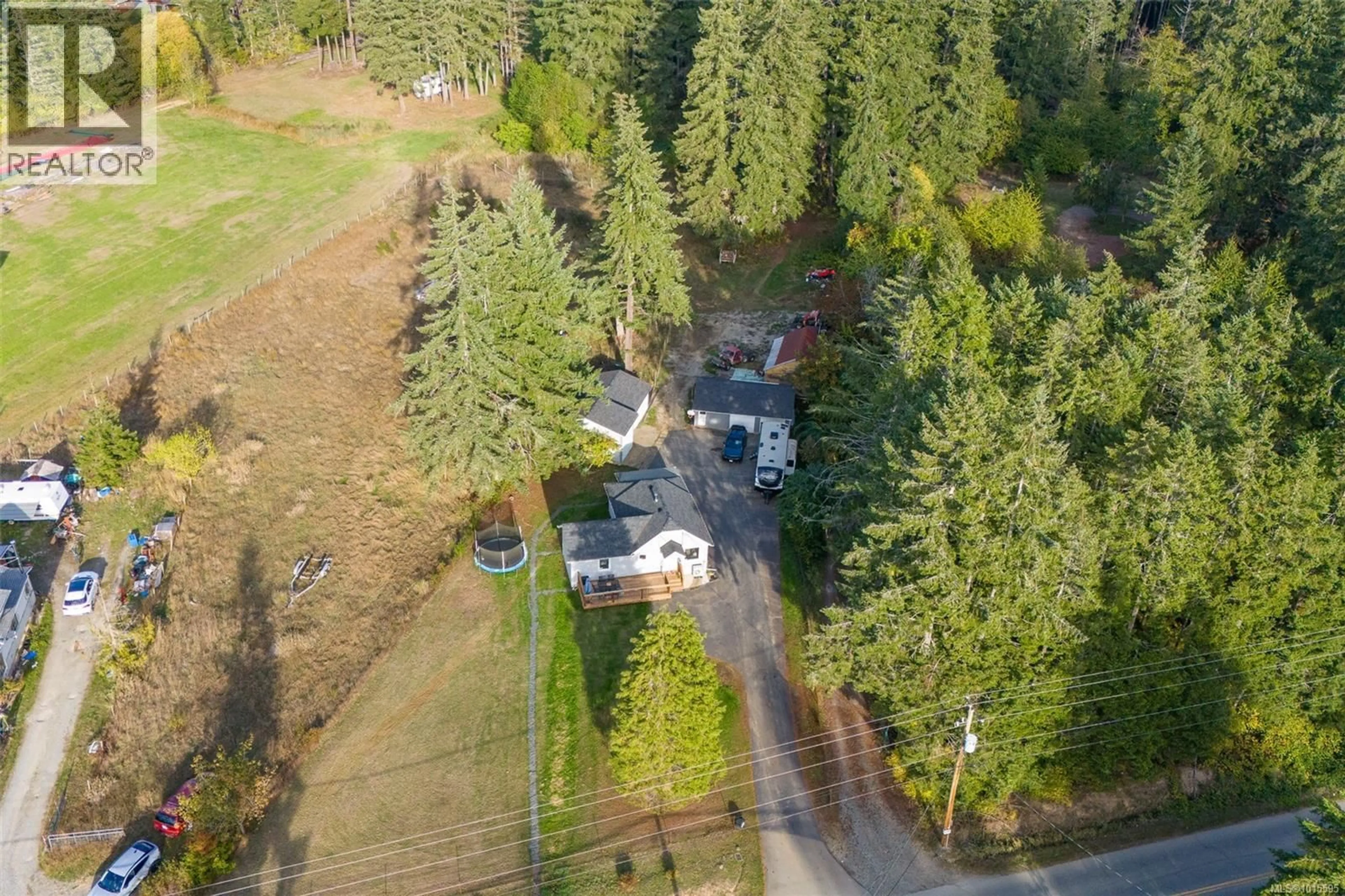 A pic from outside/outdoor area/front of a property/back of a property/a pic from drone, forest/trees view for 5739 BEAVER CREEK ROAD, Port Alberni British Columbia V9Y8X5
