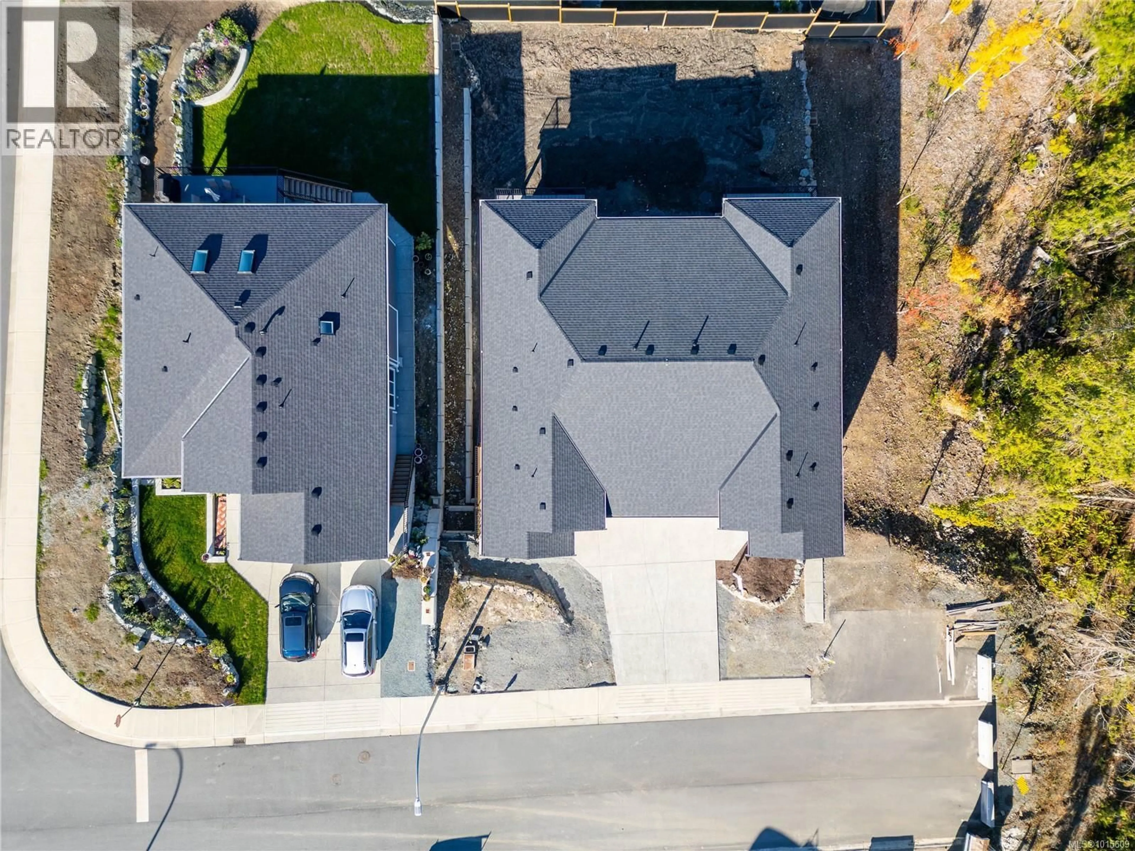A pic from outside/outdoor area/front of a property/back of a property/a pic from drone, street for 669 SANDERSON ROAD, Ladysmith British Columbia V9G0A7