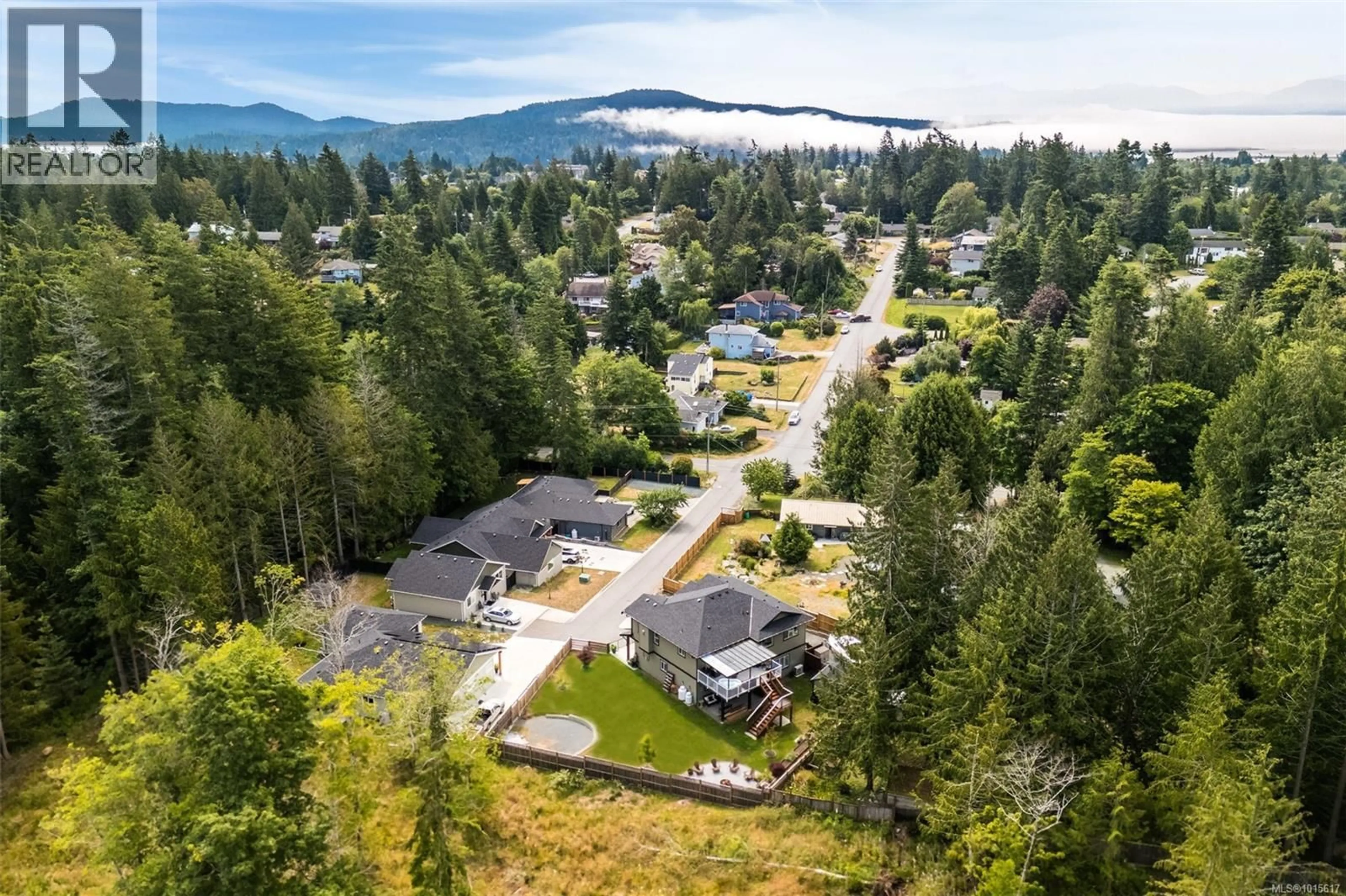 A pic from outside/outdoor area/front of a property/back of a property/a pic from drone, mountain view for 6710 HELGESEN ROAD, Sooke British Columbia V9Z0V6
