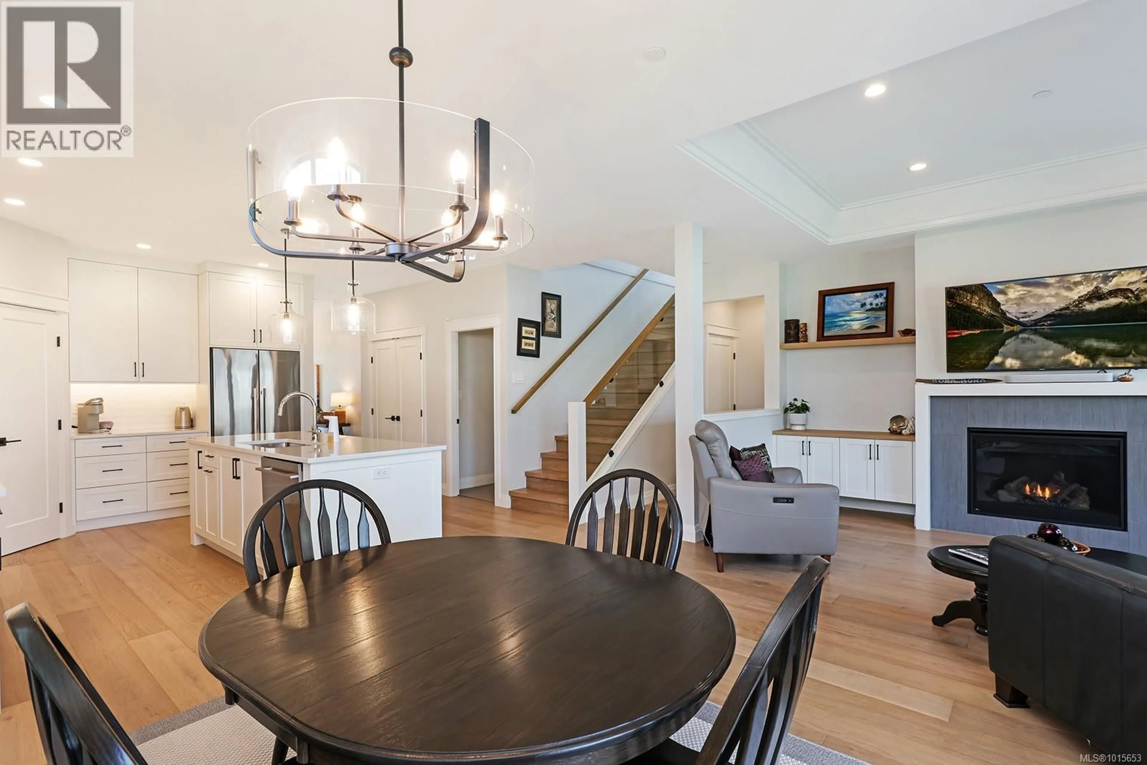 Open concept kitchen, wood/laminate floor for 115 - 1444 CROWN ISLE DRIVE, Courtenay British Columbia V9N0B8