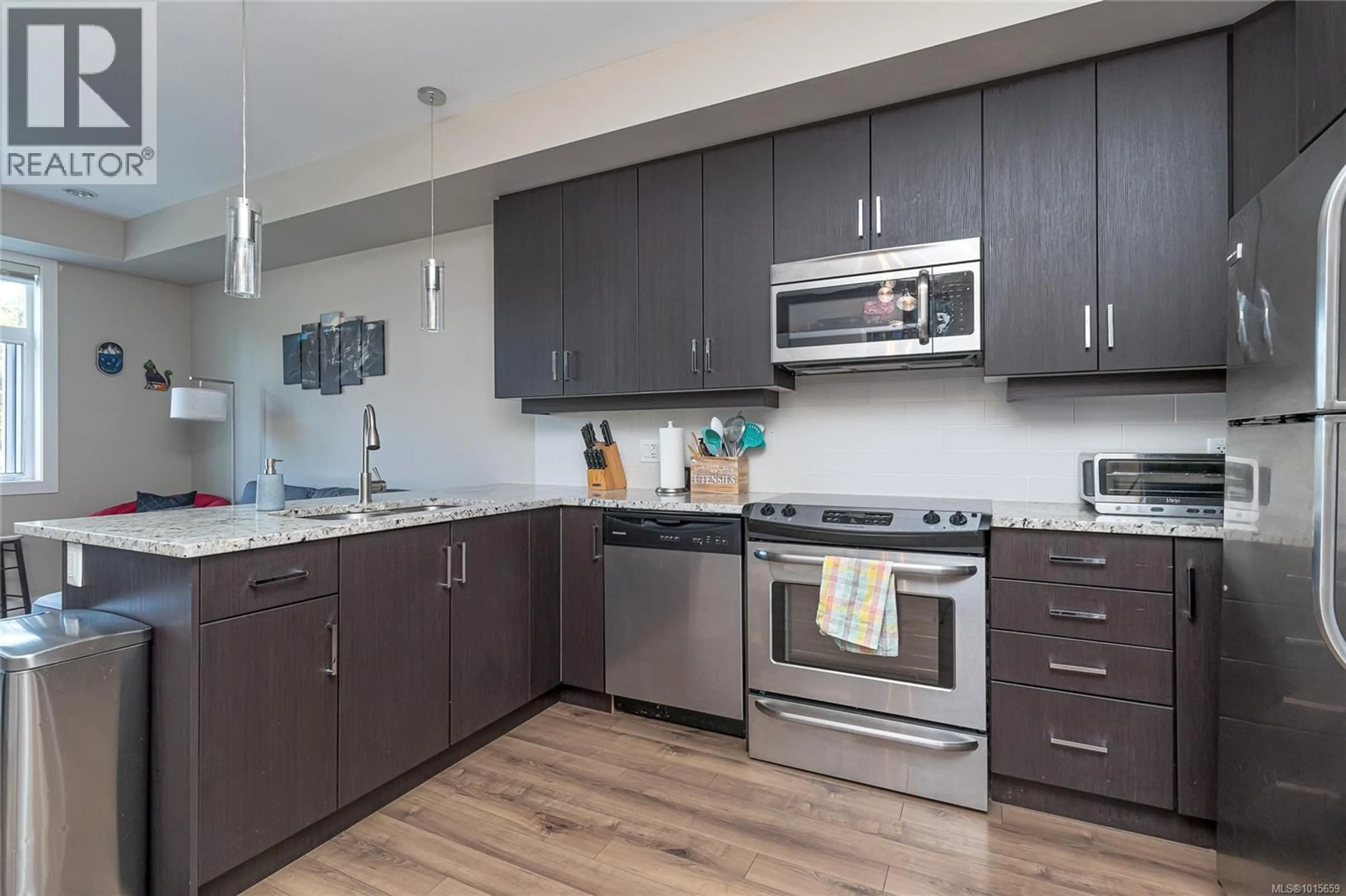 Open concept kitchen, unknown for 203 - 2655 SOOKE ROAD, Langford British Columbia V9B1Y3