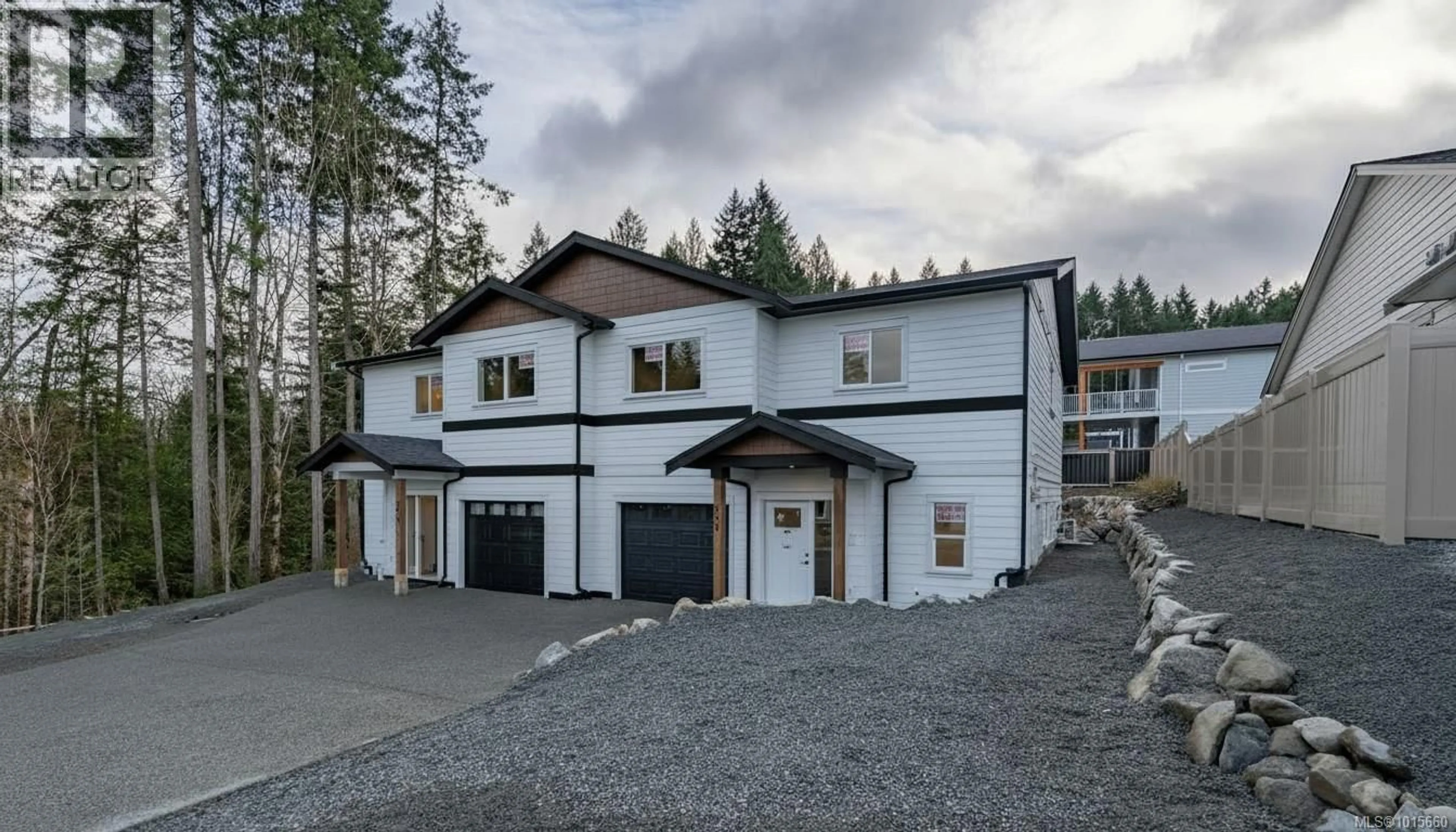 A pic from outside/outdoor area/front of a property/back of a property/a pic from drone, street for 668 SANDERSON ROAD, Ladysmith British Columbia V9G0A7