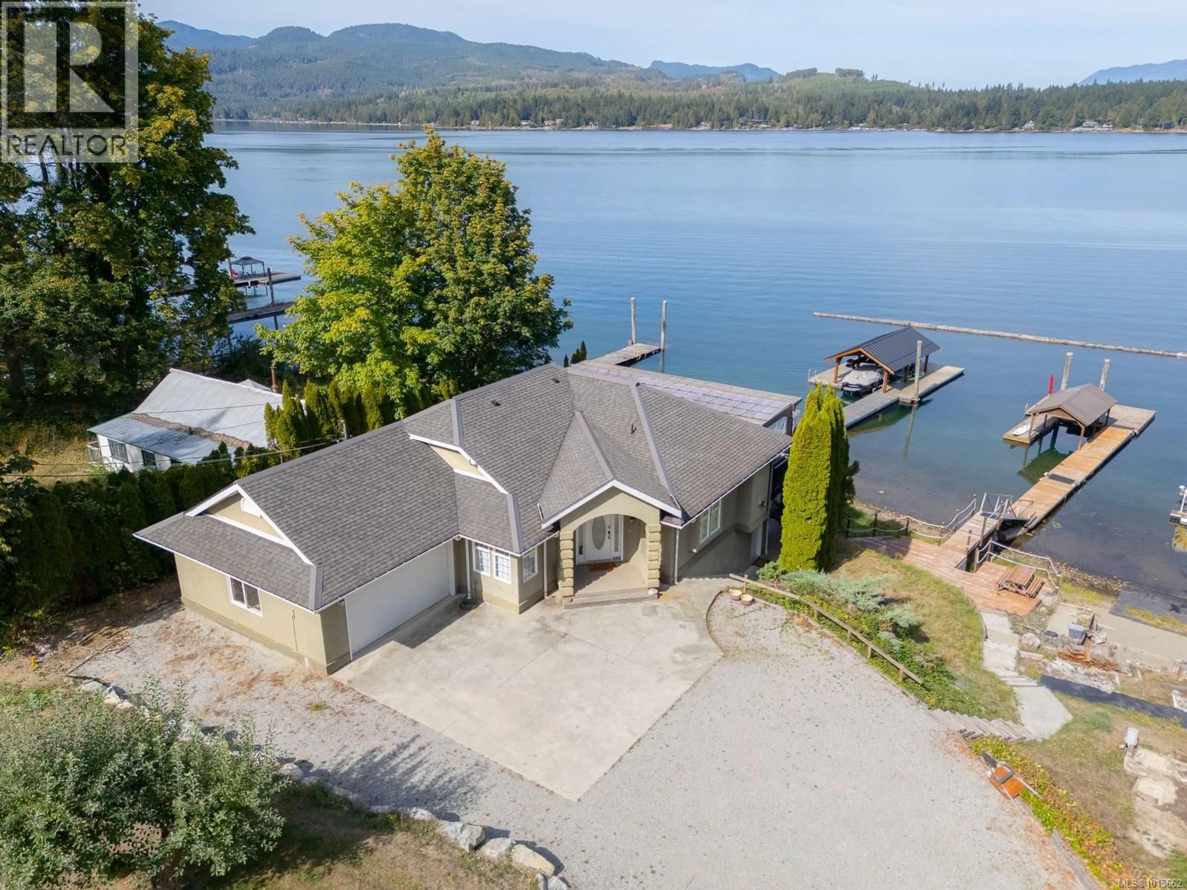A pic from outside/outdoor area/front of a property/back of a property/a pic from drone, water/lake/river/ocean view for 9050 LORD ROAD, Port Alberni British Columbia V9Y9C1