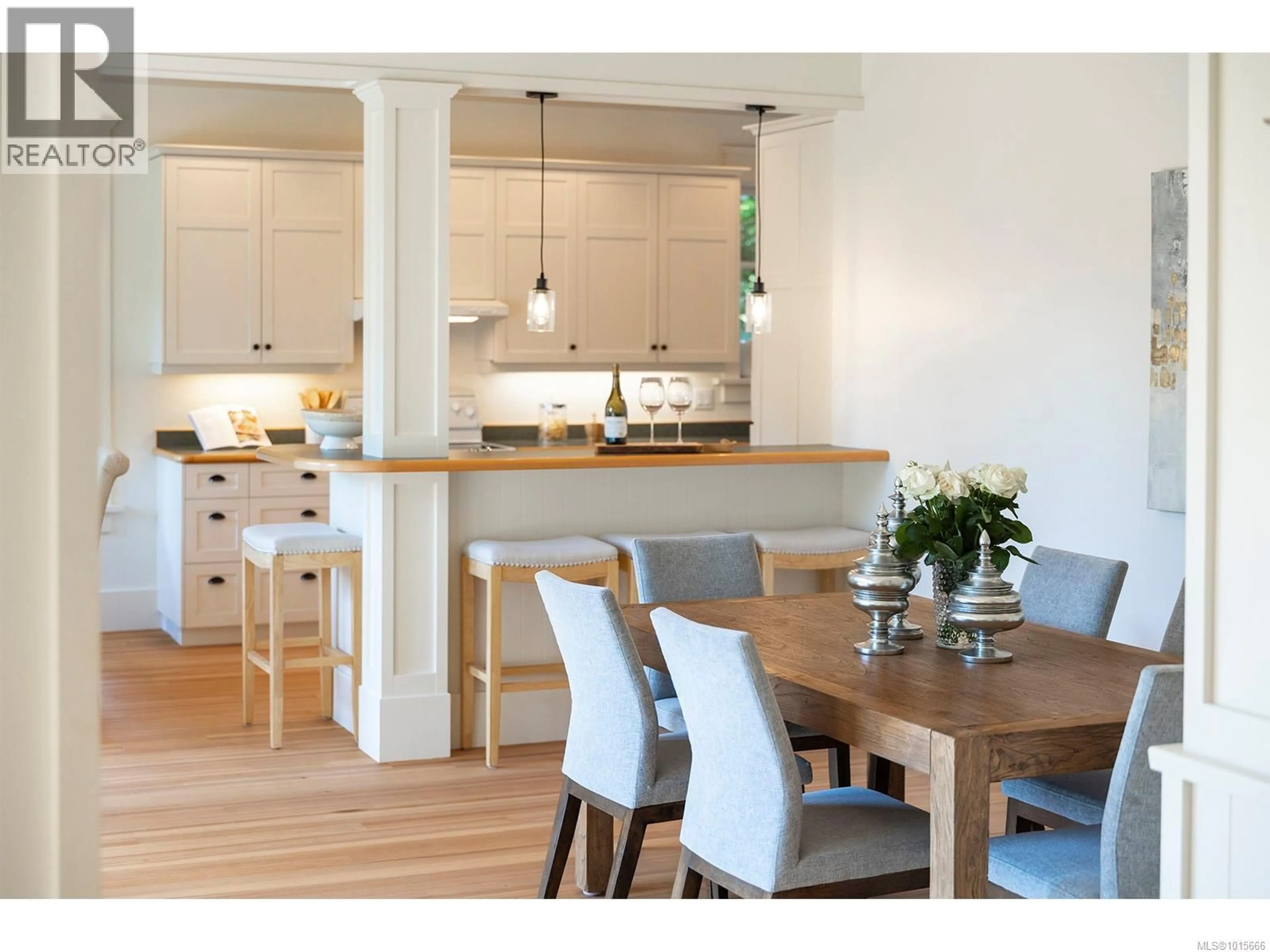 Open concept kitchen, wood/laminate floor for 906 MT. NEWTON CROSS ROAD, Central Saanich British Columbia V8M1S2