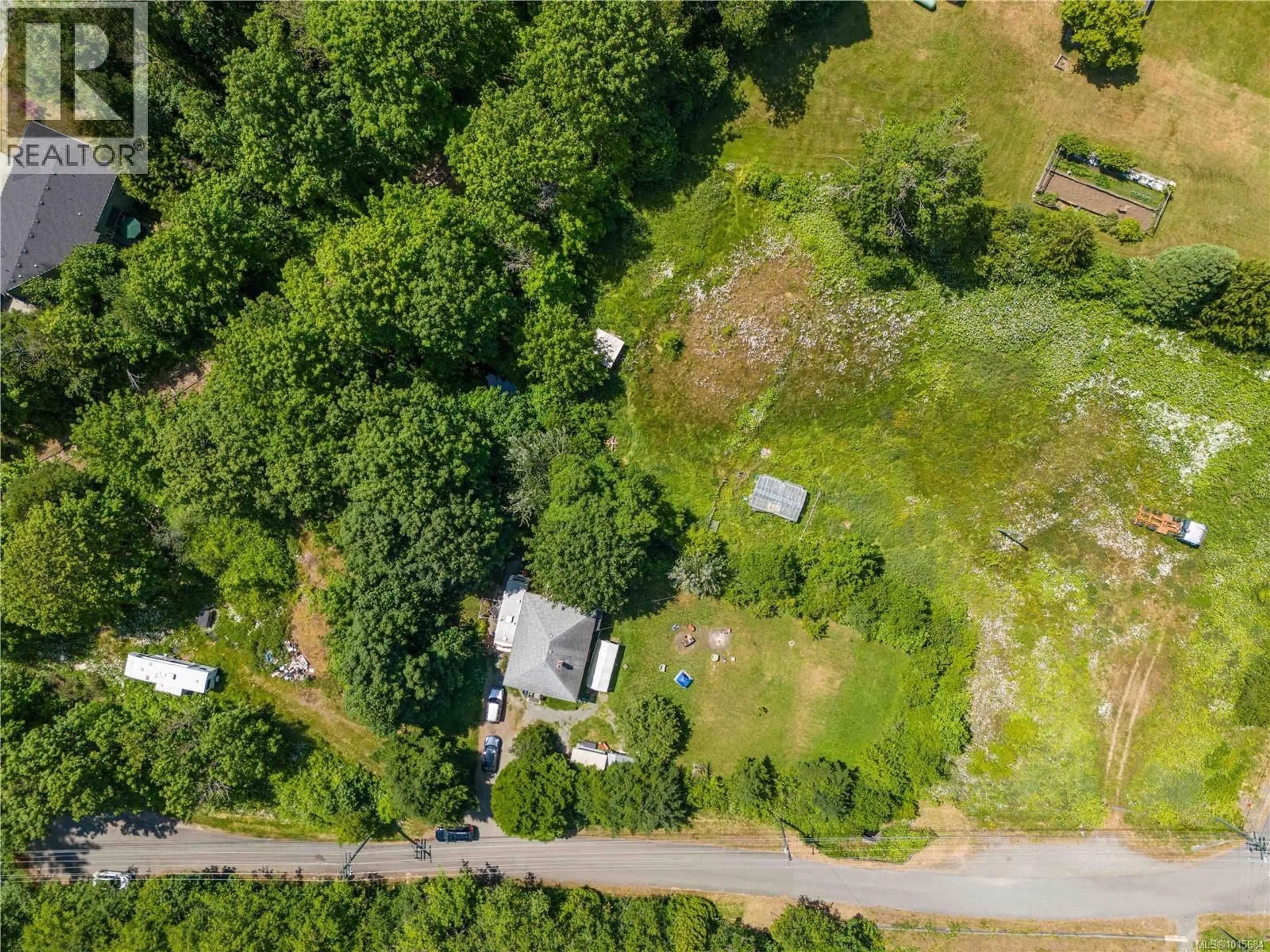 A pic from outside/outdoor area/front of a property/back of a property/a pic from drone, forest/trees view for 1551 FRAMES ROAD, Nanaimo British Columbia V9R6R3