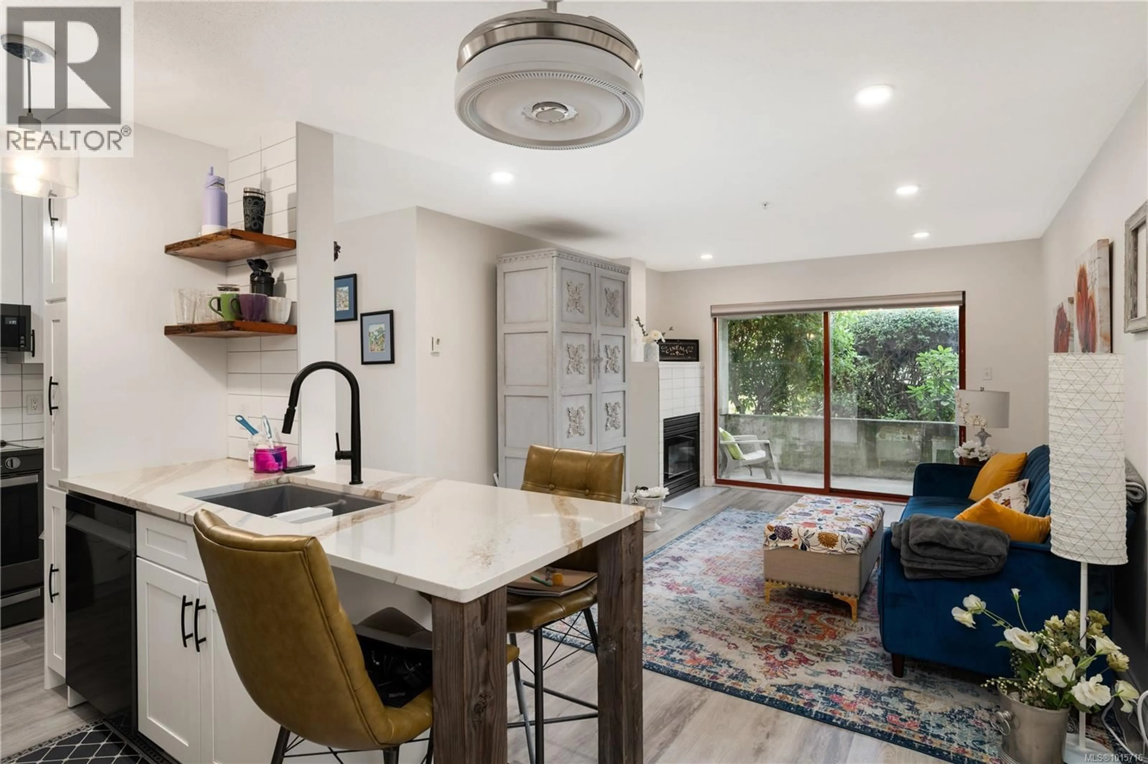 Open concept kitchen, ceramic/tile floor for 107 - 873 ESQUIMALT ROAD, Esquimalt British Columbia V9A3M5