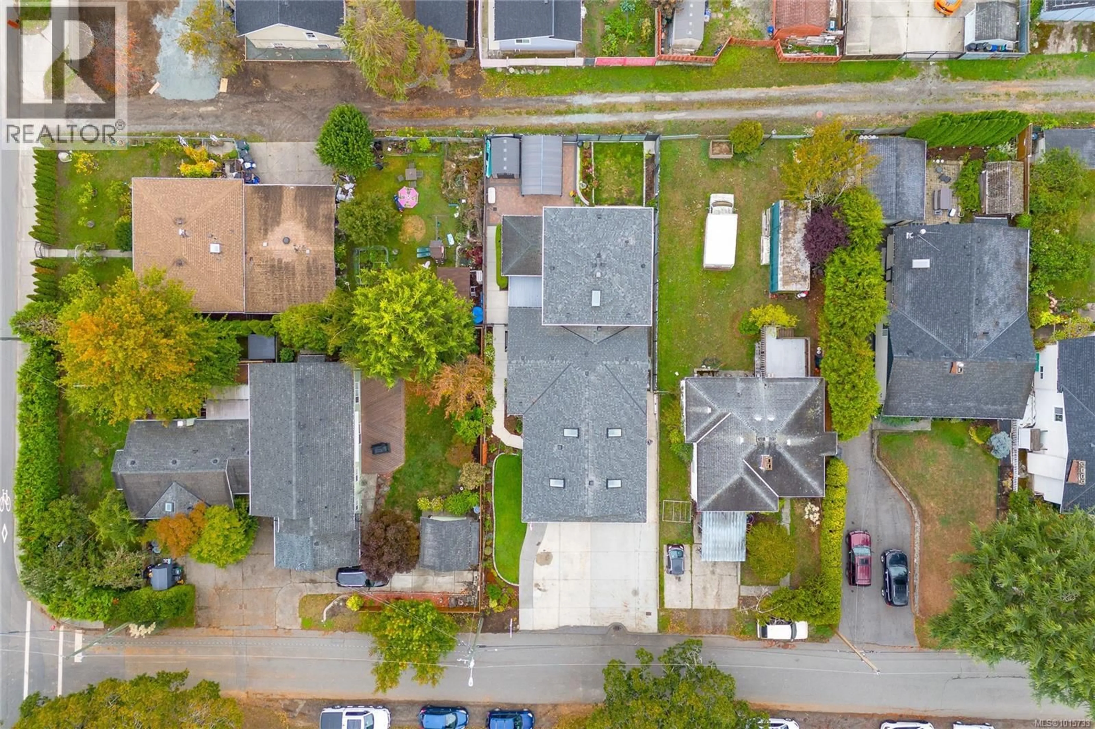 A pic from outside/outdoor area/front of a property/back of a property/a pic from drone, street for 1221 CHERRY ROAD, Saanich British Columbia V8Z2Y4