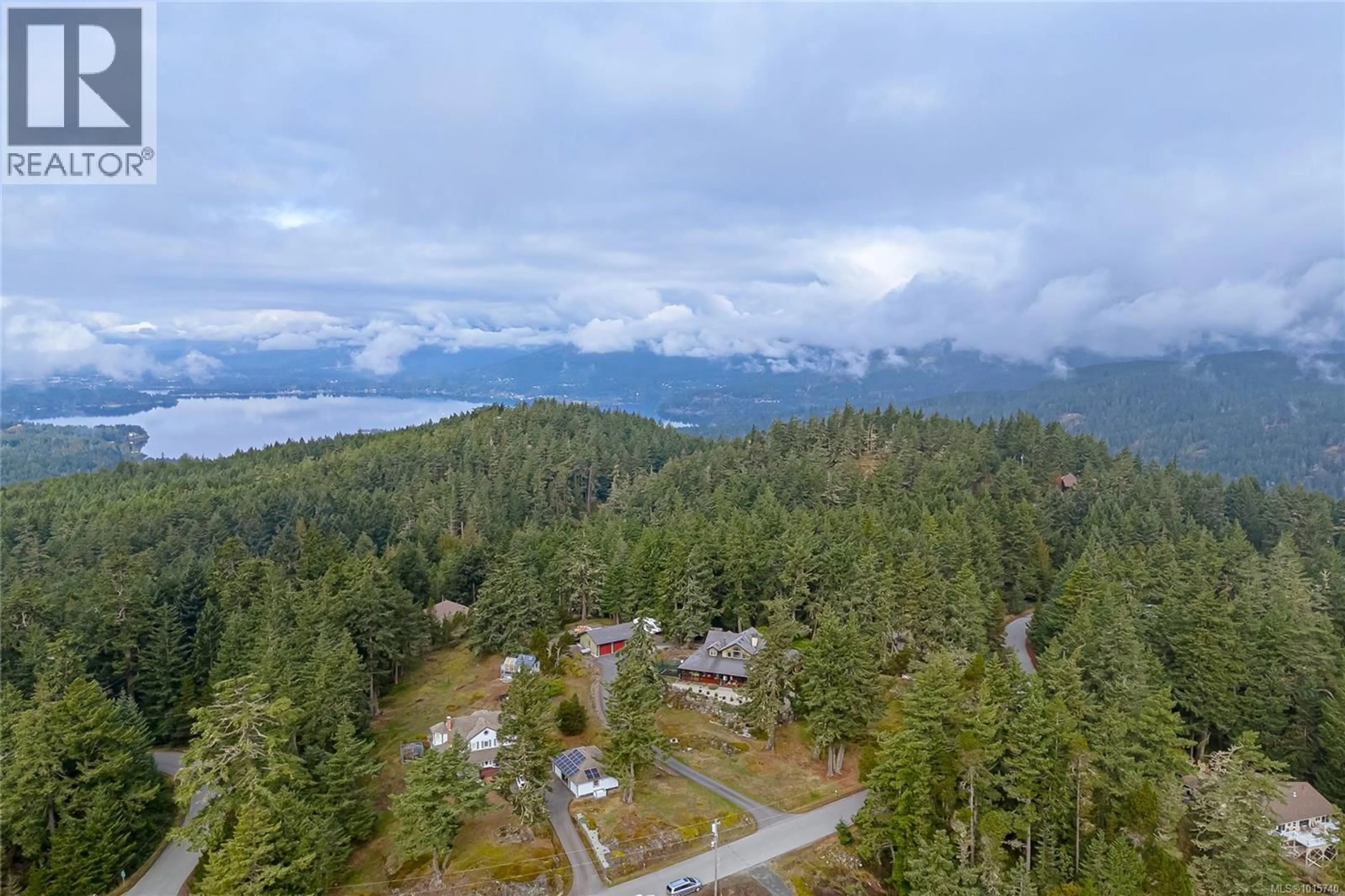 A pic from outside/outdoor area/front of a property/back of a property/a pic from drone, unknown for 700 CAINS WAY, Sooke British Columbia V9Z1C5