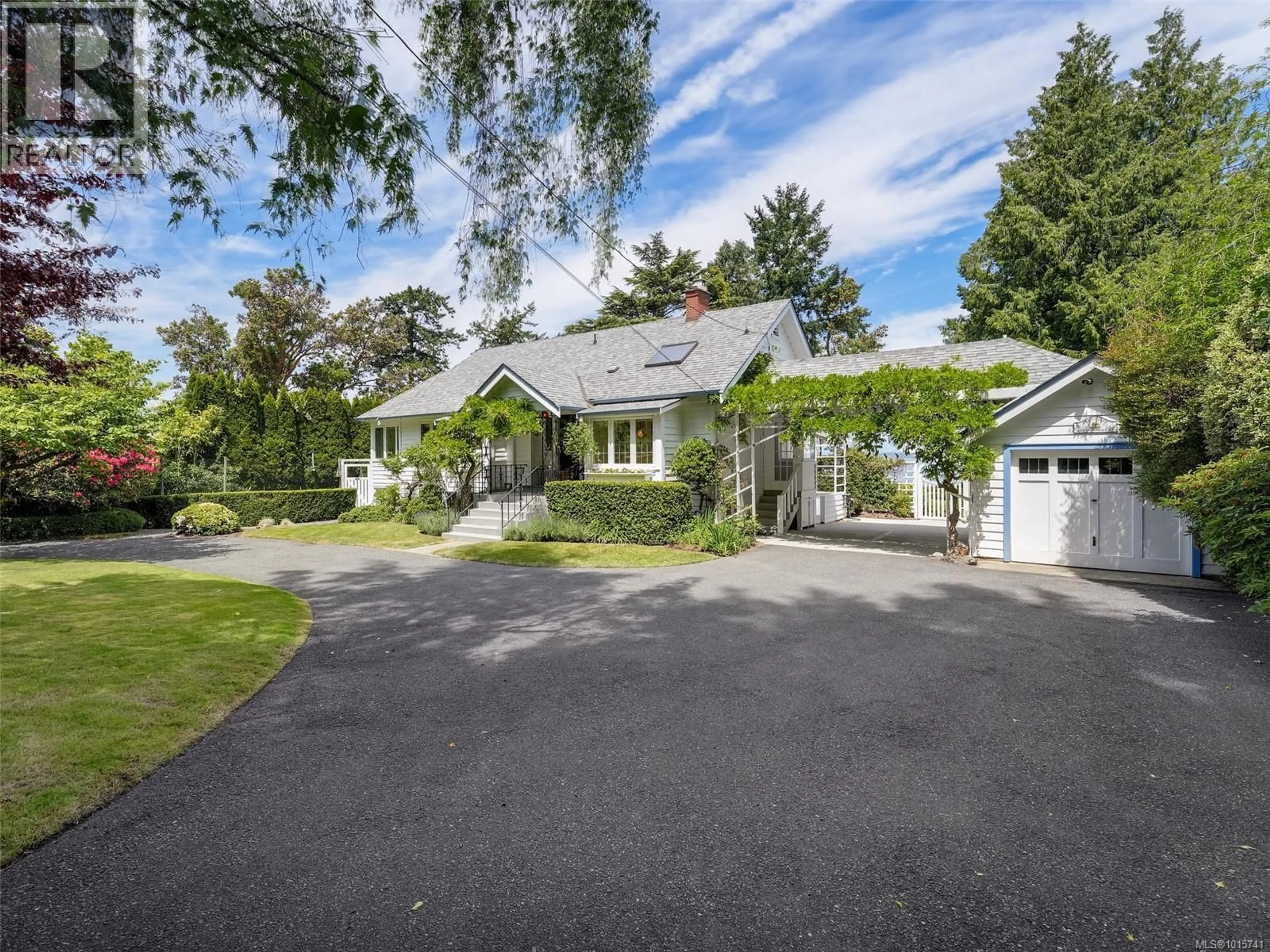 A pic from outside/outdoor area/front of a property/back of a property/a pic from drone, street for 4590 TORQUAY DRIVE, Saanich British Columbia V8N3L7