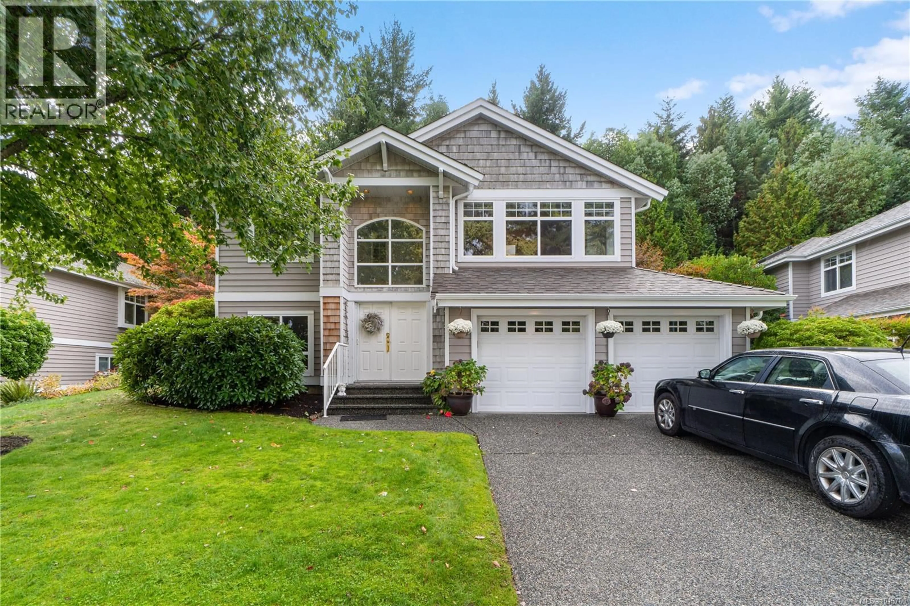 Home with vinyl exterior material, street for 1266 SATURNA DRIVE, Parksville British Columbia V9P2X6