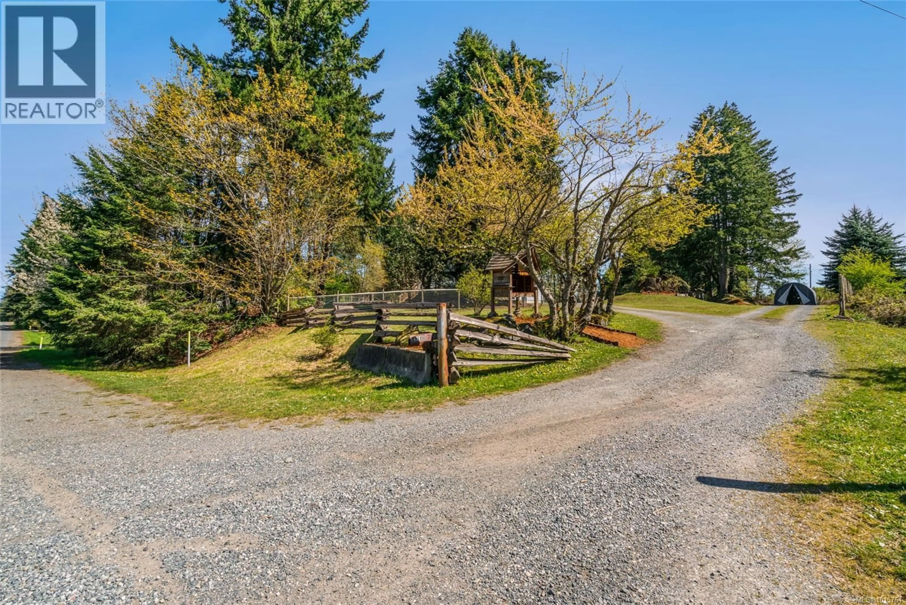 A pic from outside/outdoor area/front of a property/back of a property/a pic from drone, unknown for 1121 HAREWOOD MINES ROAD, Nanaimo British Columbia V9R5W9