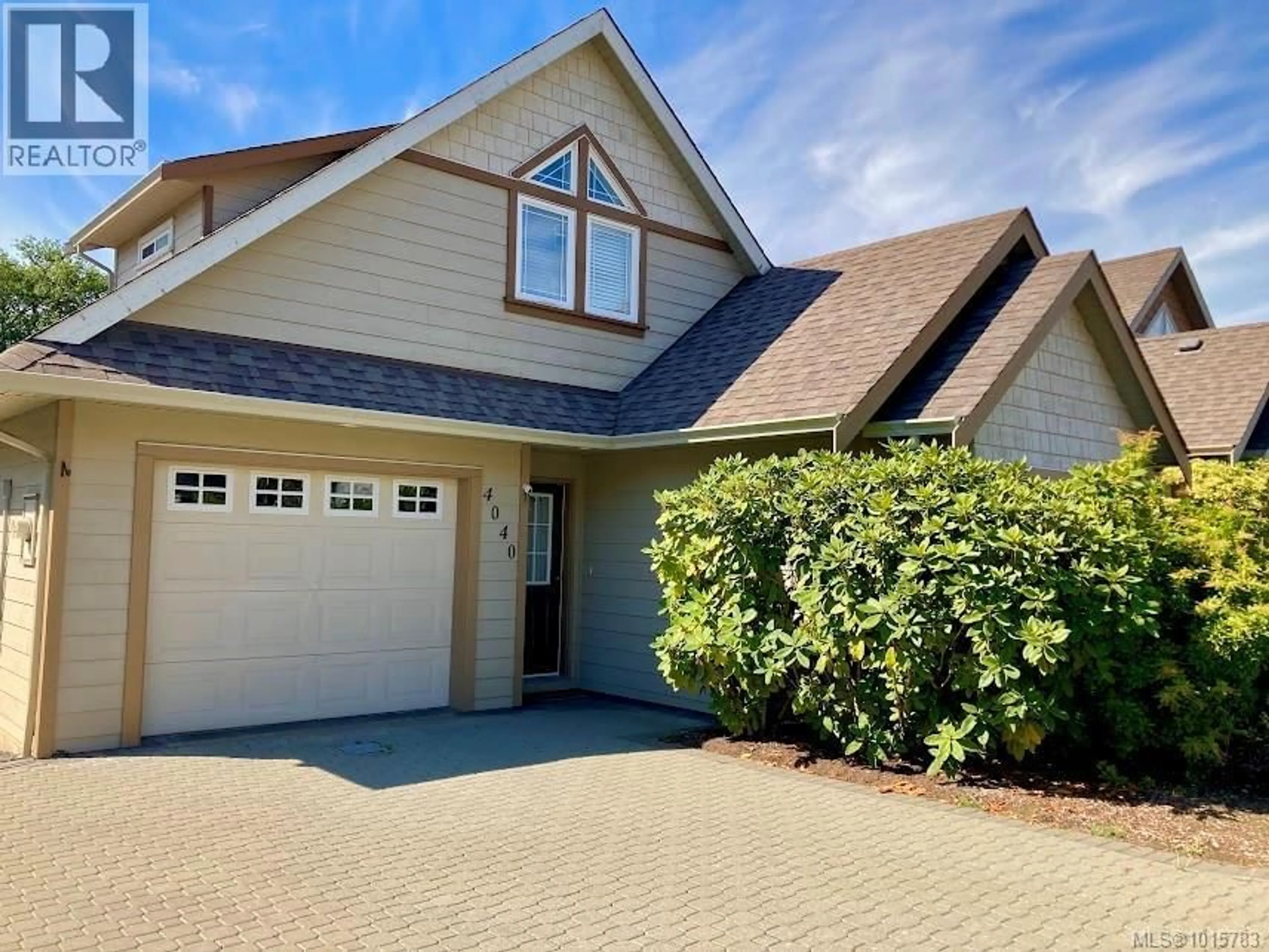 Home with vinyl exterior material, street for 4040 BLACKBERRY LANE, Saanich British Columbia V8X5J4