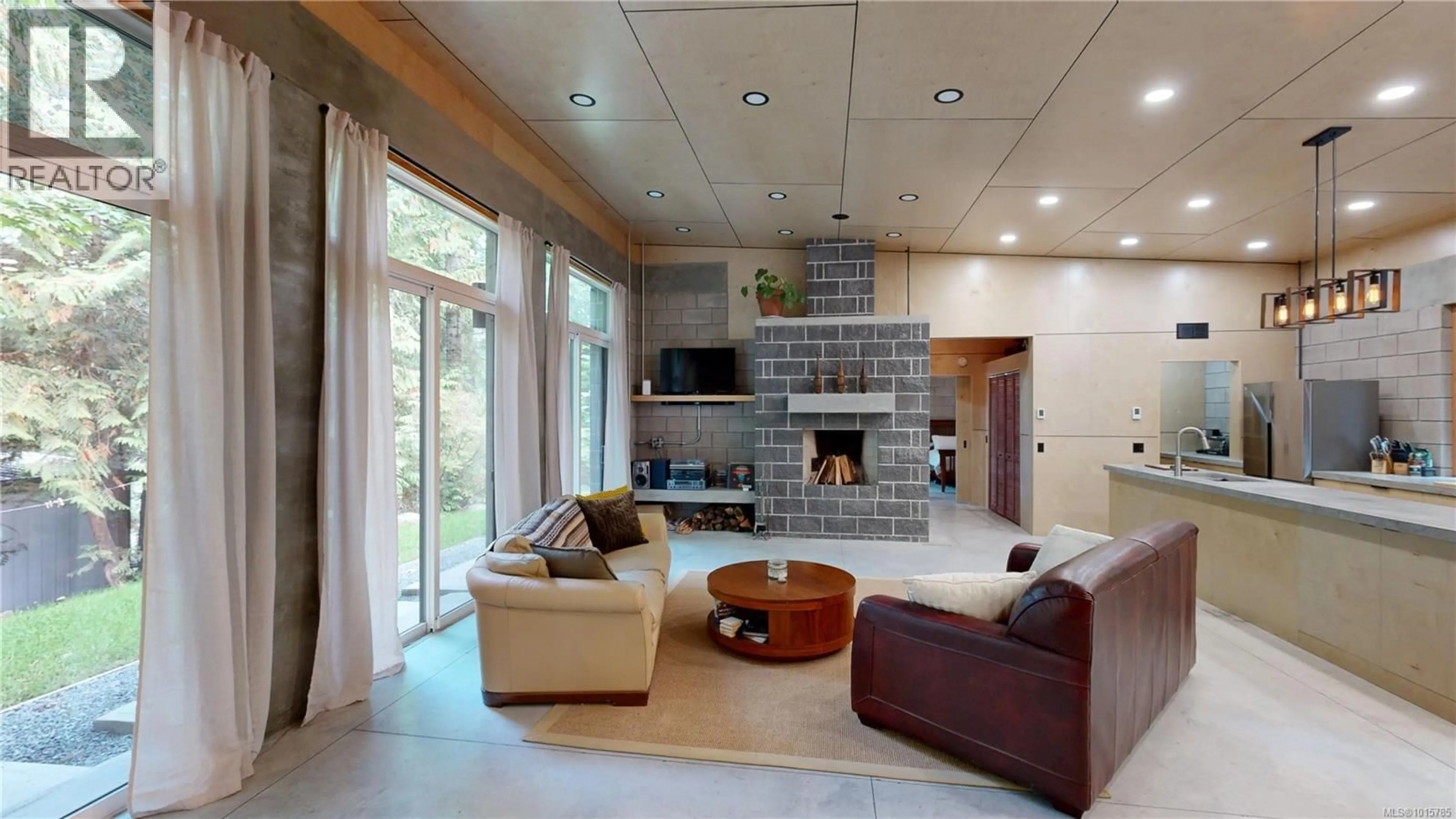Living room with furniture, ceramic/tile floor for 362 SPRUCE AVENUE, Gabriola Island British Columbia V0R1X1