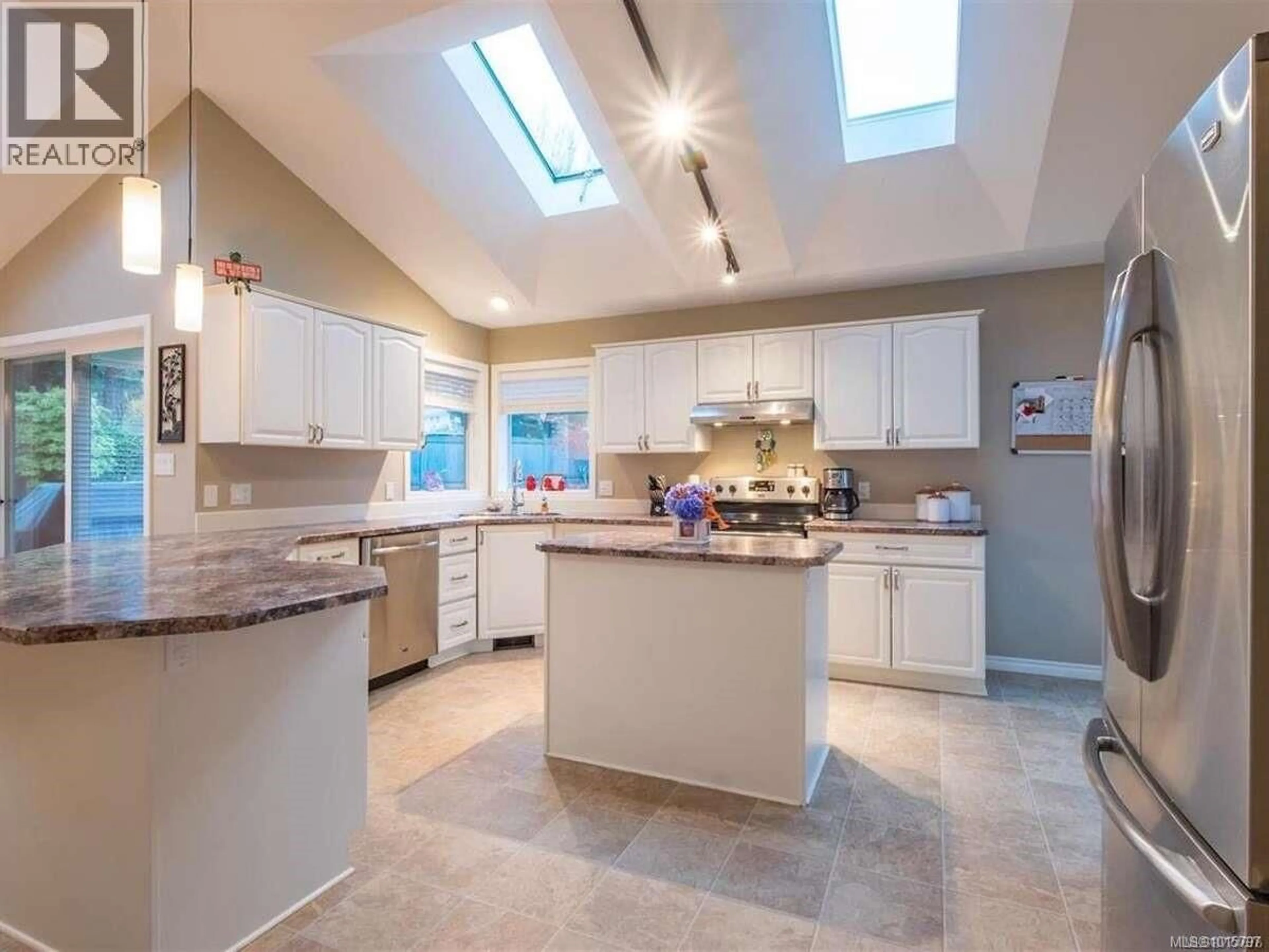 Open concept kitchen, ceramic/tile floor for 5826 CUTTER PLACE, Nanaimo British Columbia V9V1L7