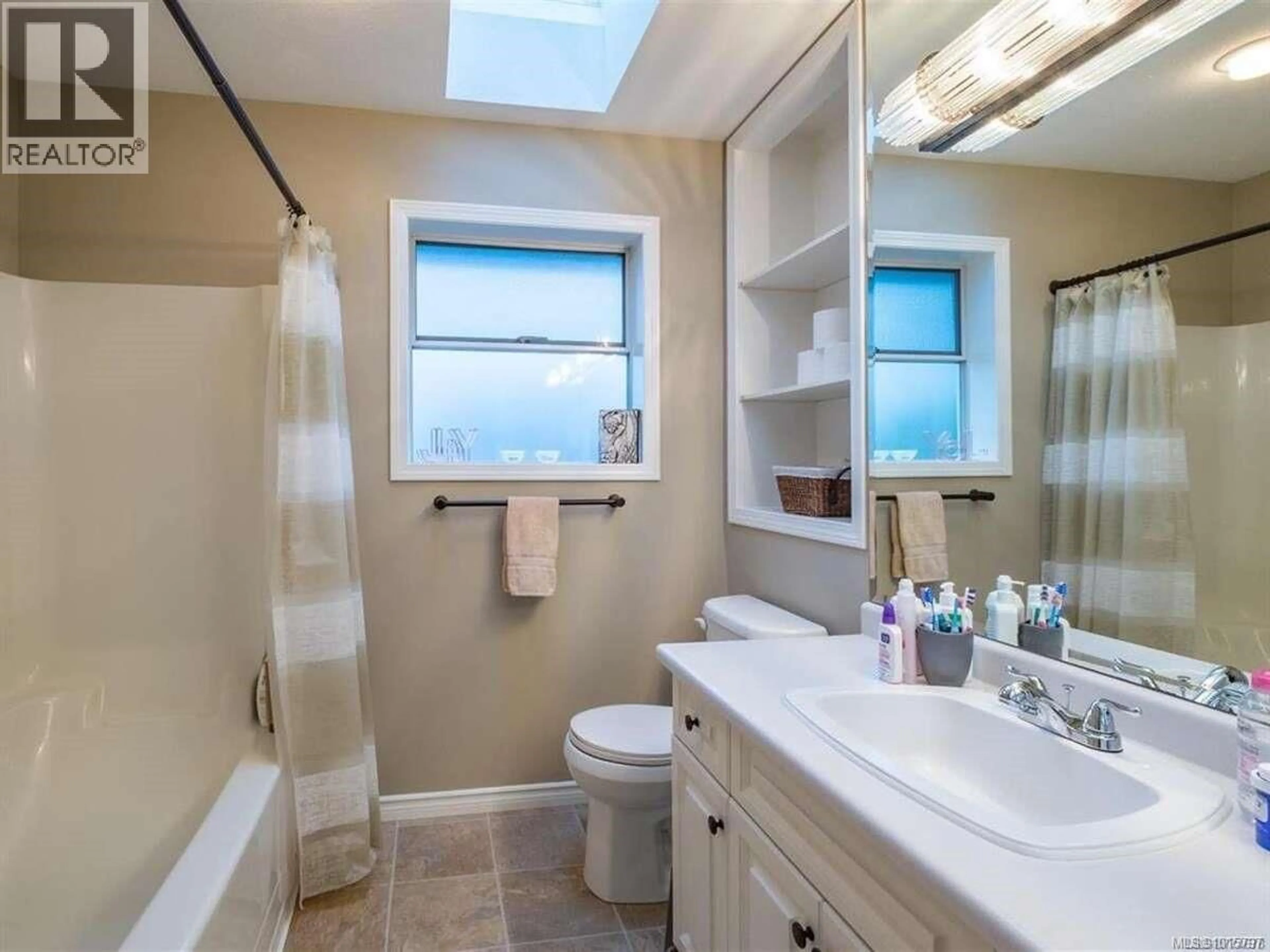 Standard bathroom, ceramic/tile floor for 5826 CUTTER PLACE, Nanaimo British Columbia V9V1L7
