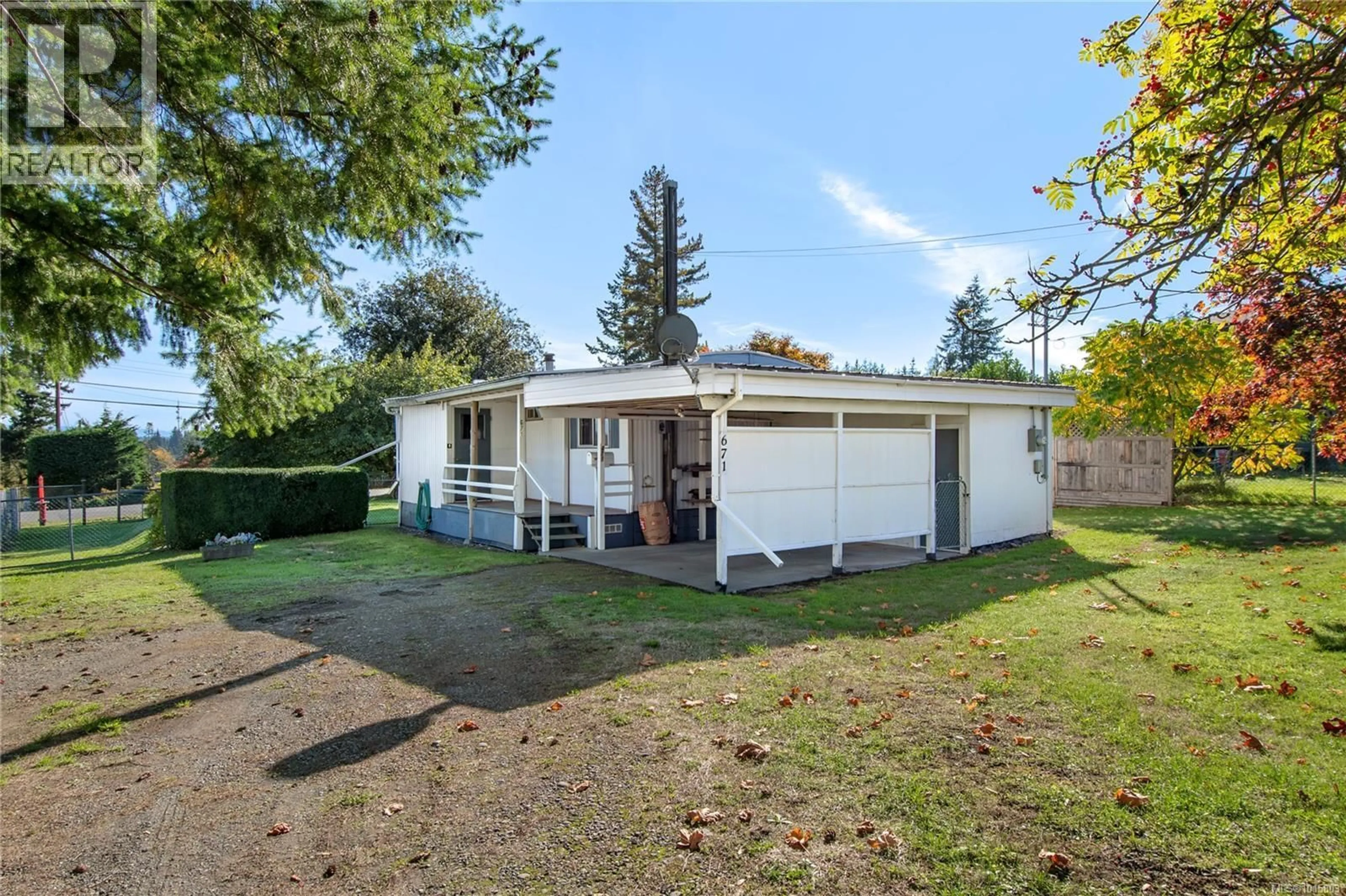 A pic from outside/outdoor area/front of a property/back of a property/a pic from drone, street for 671 PETERSEN ROAD, Campbell River British Columbia V9W3H6