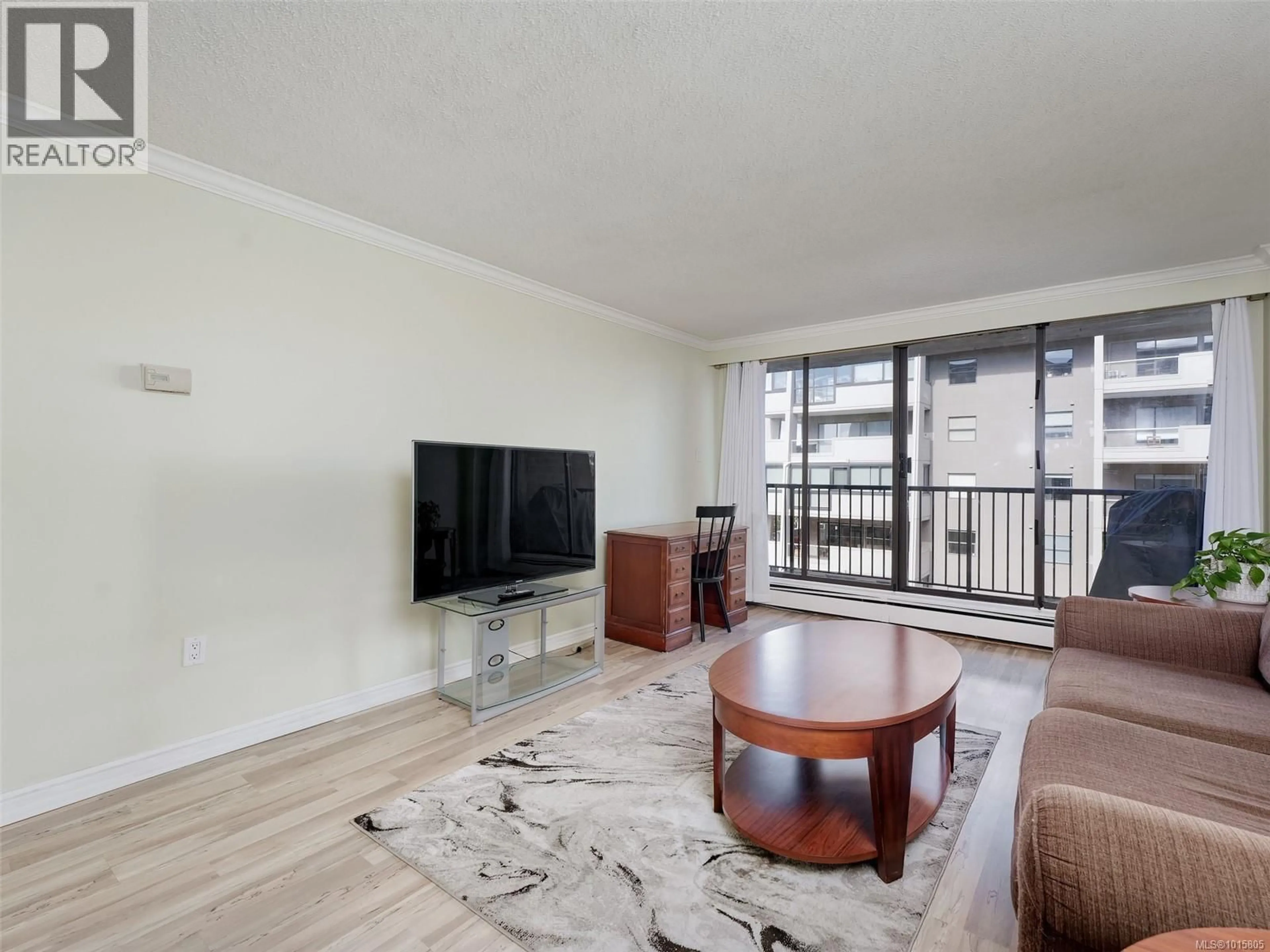 Living room with furniture, unknown for 604 - 777 BLANSHARD STREET, Victoria British Columbia V8W2G9