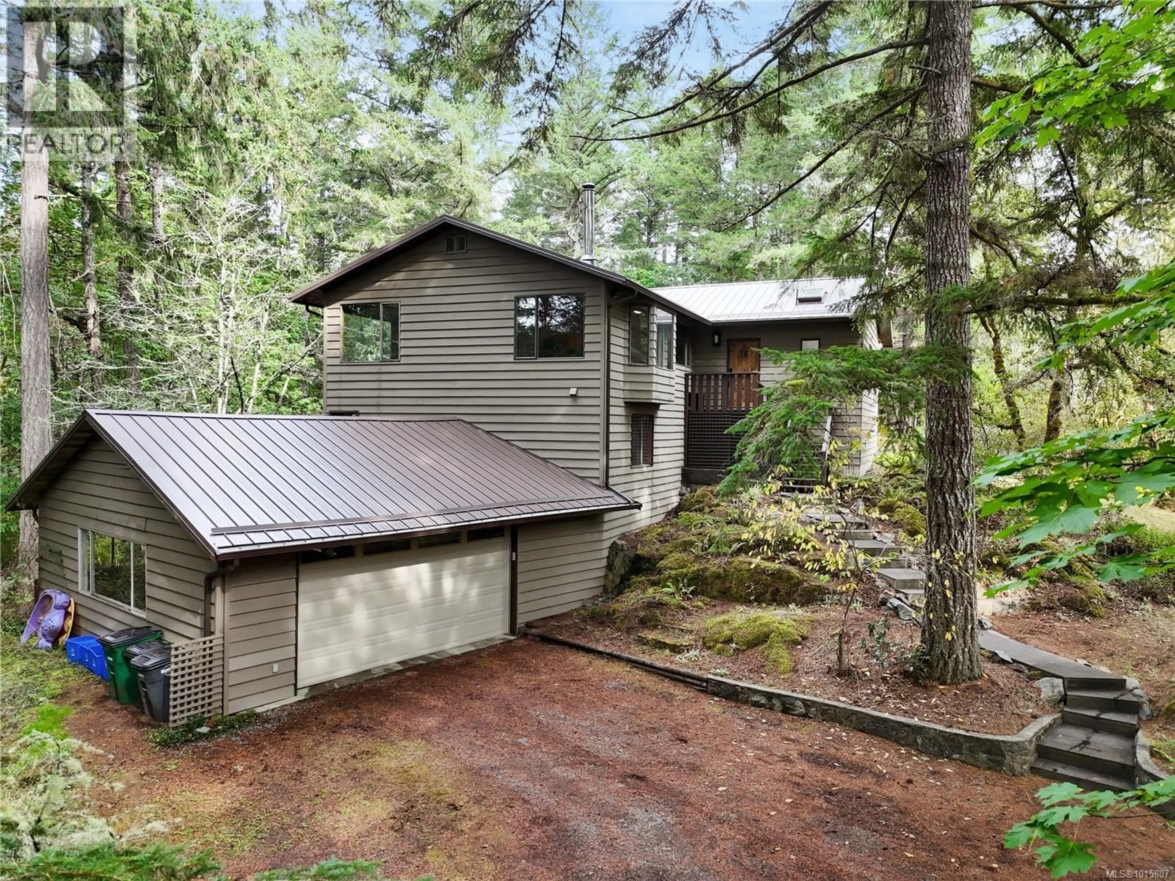 Home with vinyl exterior material, forest/trees view for 100 VIADUCT AVENUE WEST, Saanich British Columbia V9E1J3