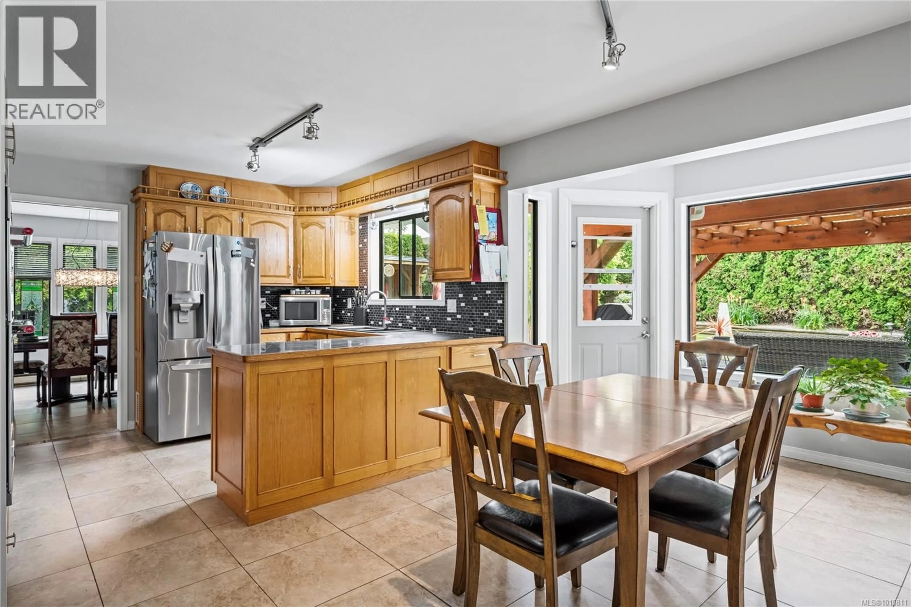 Open concept kitchen, ceramic/tile floor for 870 CAVIN ROAD, French Creek British Columbia V9P1Z9