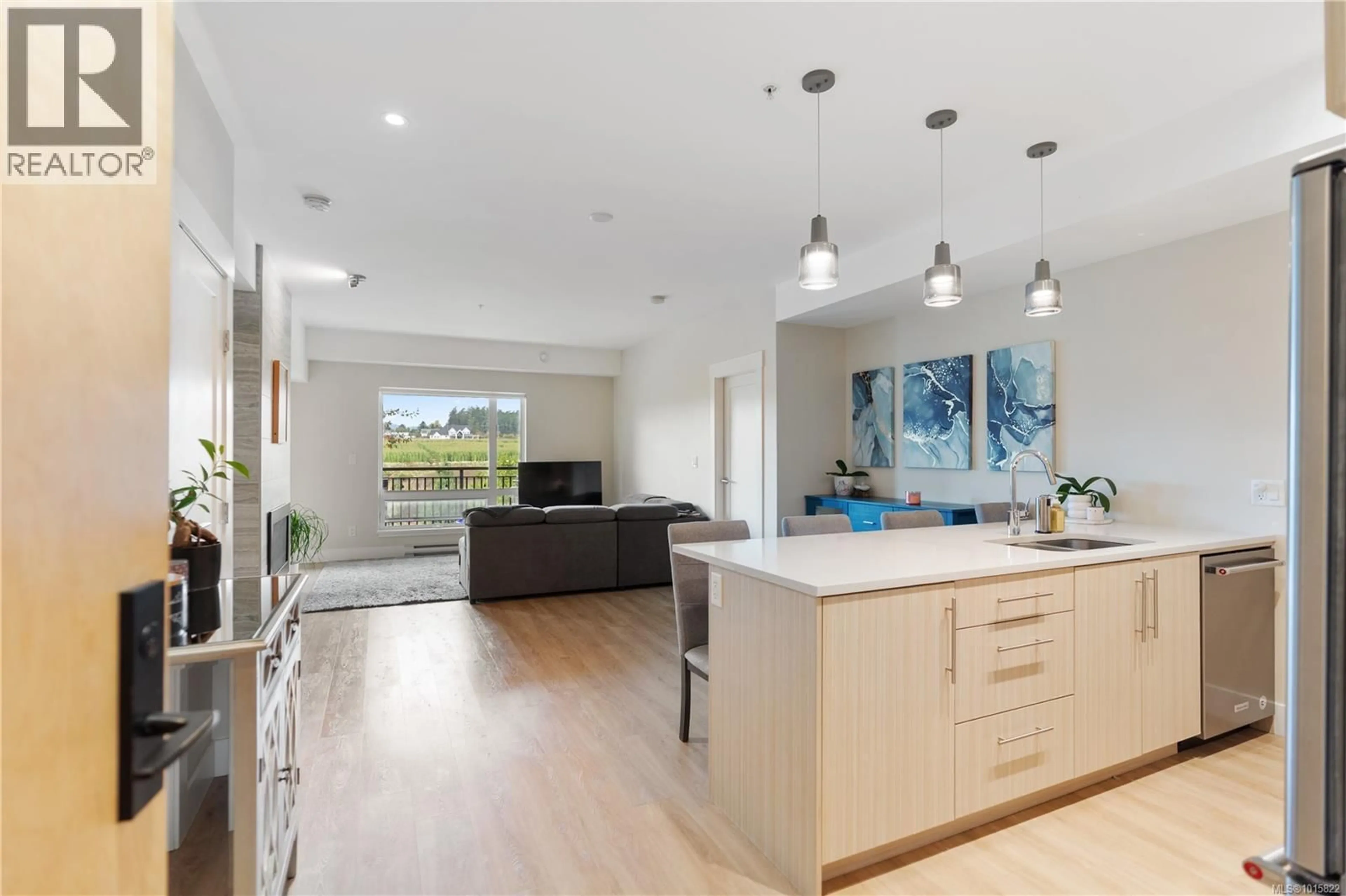 Open concept kitchen, unknown for 303 - 2500 HACKETT CRESCENT, Central Saanich British Columbia V8M0C1