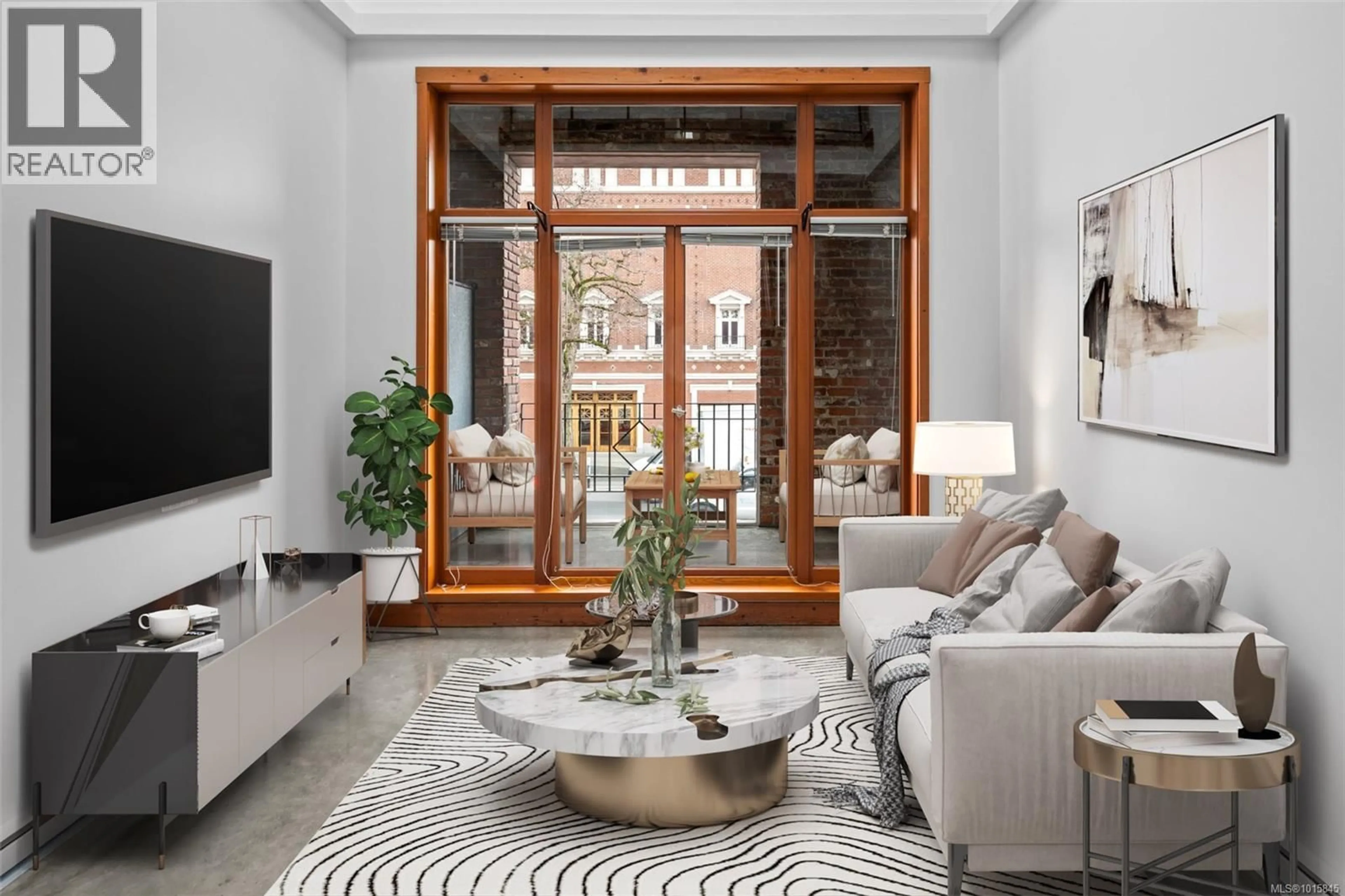 Living room with furniture, unknown for 203 - 588 PANDORA AVENUE, Victoria British Columbia V8W1N7