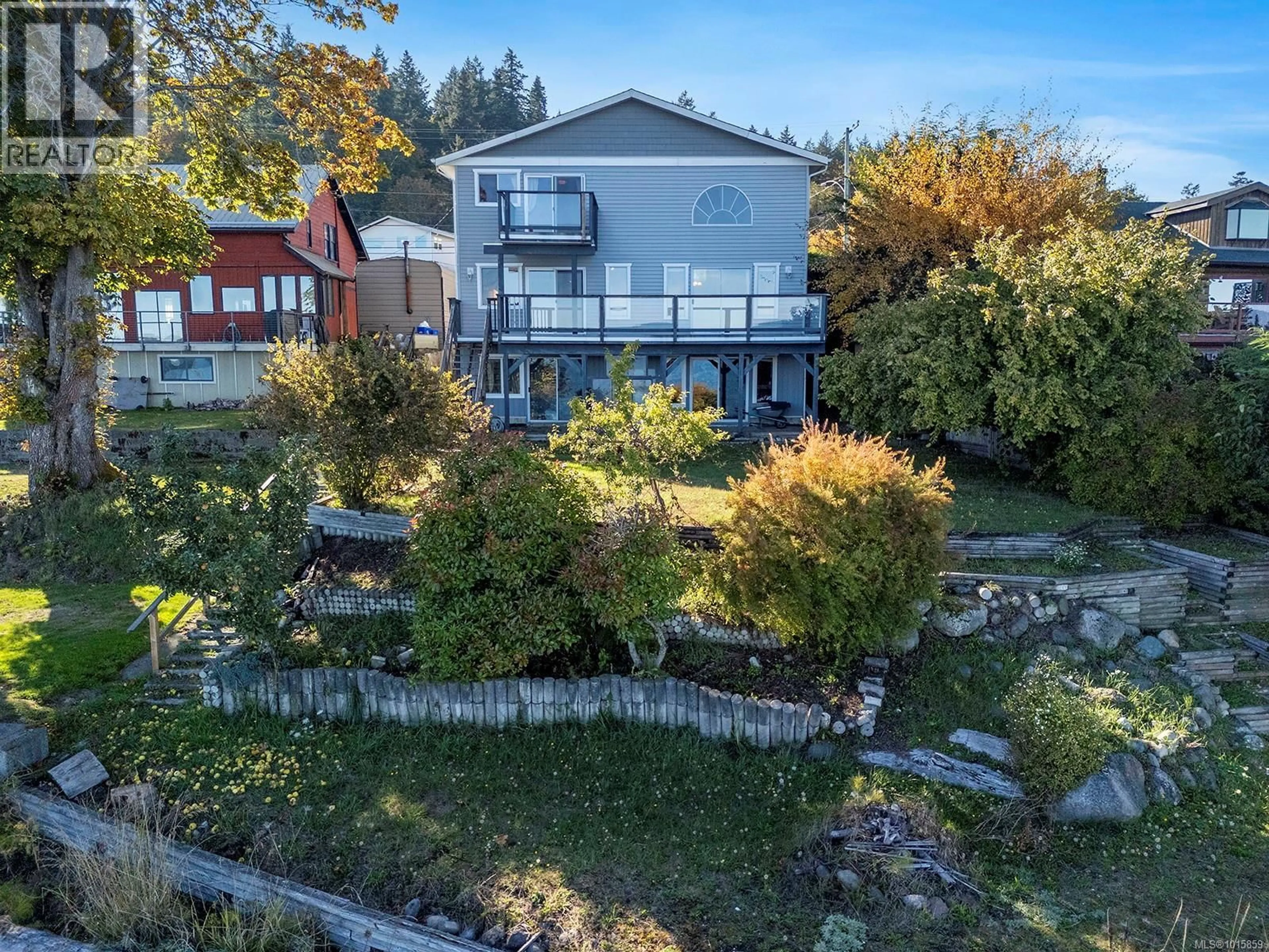 A pic from outside/outdoor area/front of a property/back of a property/a pic from drone, unknown for 5650 ISLAND HIGHWAY SOUTH, Union Bay British Columbia V0R3B0