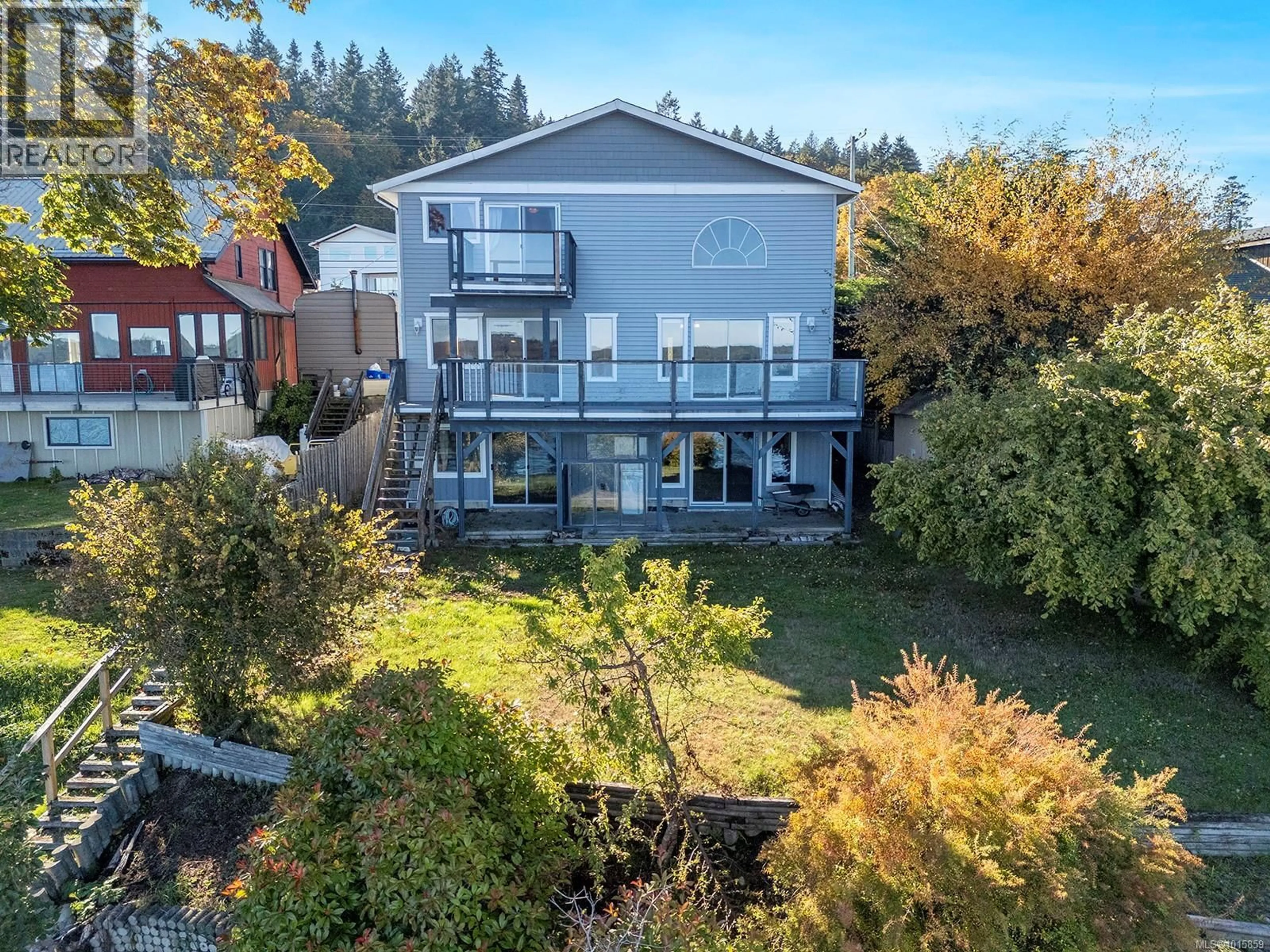A pic from outside/outdoor area/front of a property/back of a property/a pic from drone, unknown for 5650 ISLAND HIGHWAY SOUTH, Union Bay British Columbia V0R3B0