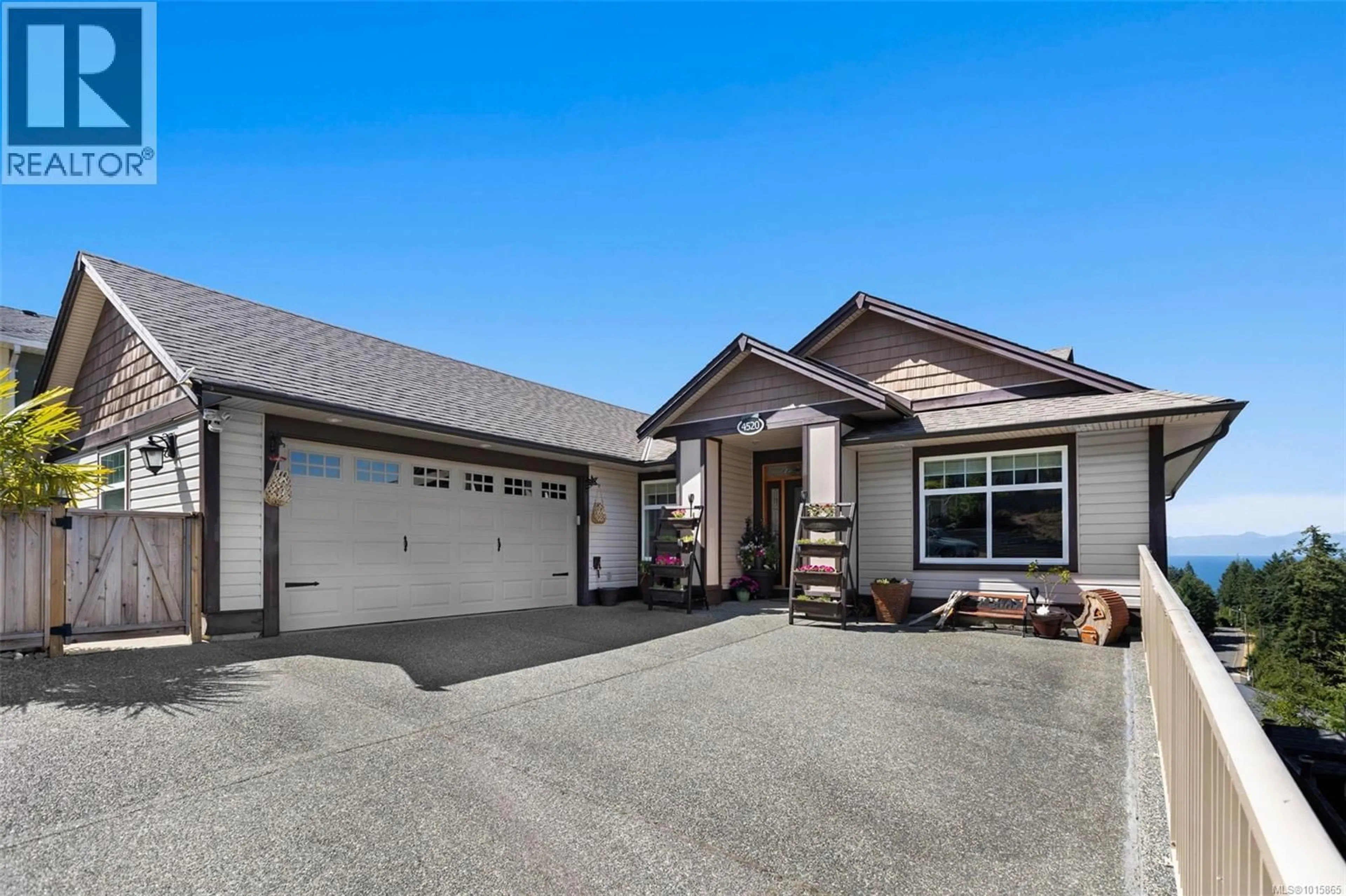 Home with vinyl exterior material, street for 4520 SHERIDAN RIDGE ROAD, Nanaimo British Columbia V9T6S7