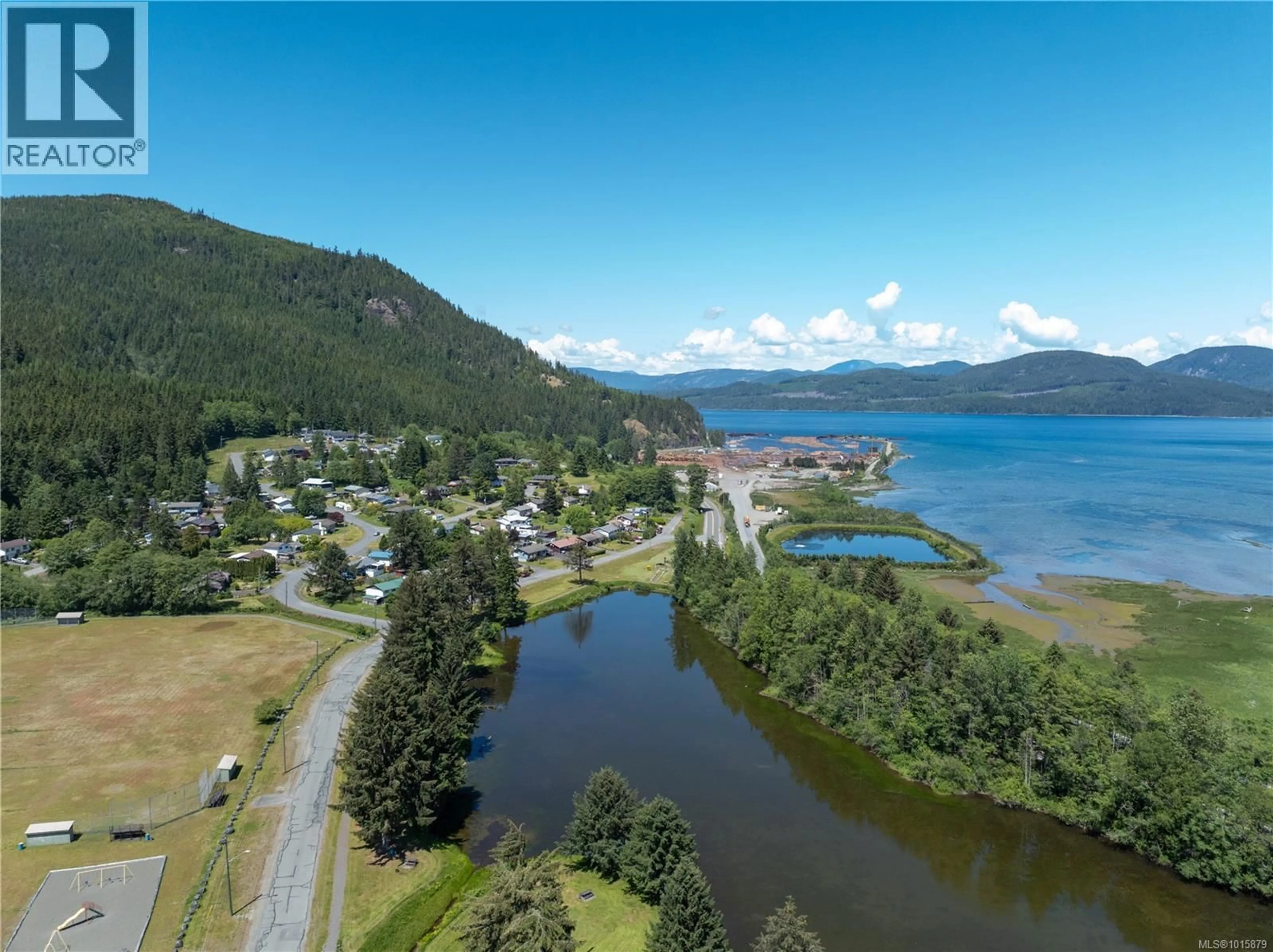 A pic from outside/outdoor area/front of a property/back of a property/a pic from drone, water/lake/river/ocean view for 204 - 611 MACMILLAN DRIVE, Sayward British Columbia V0P1R0