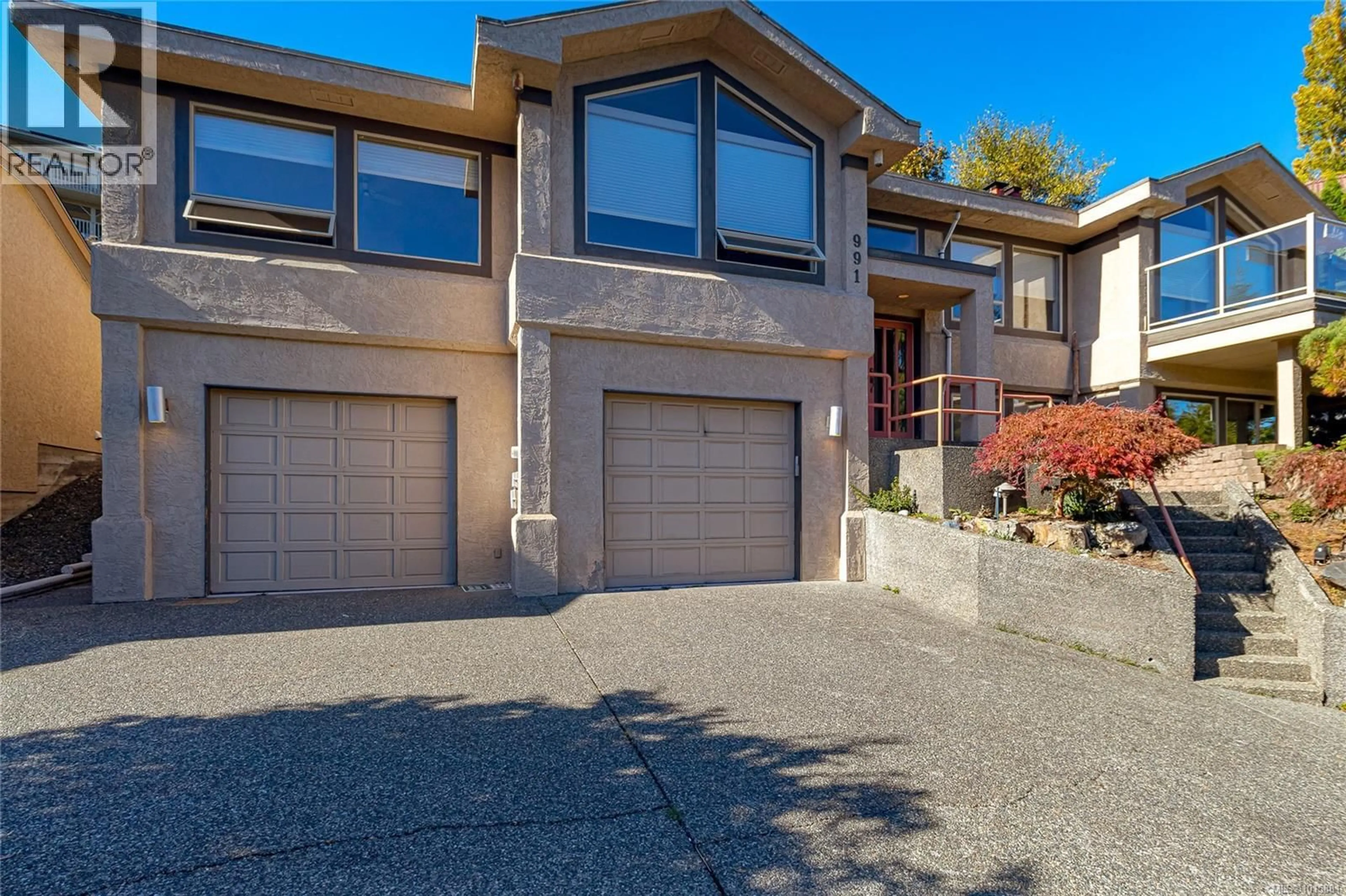 Home with brick exterior material, street for 991 SEAPEARL PLACE, Saanich British Columbia V8Y2X4