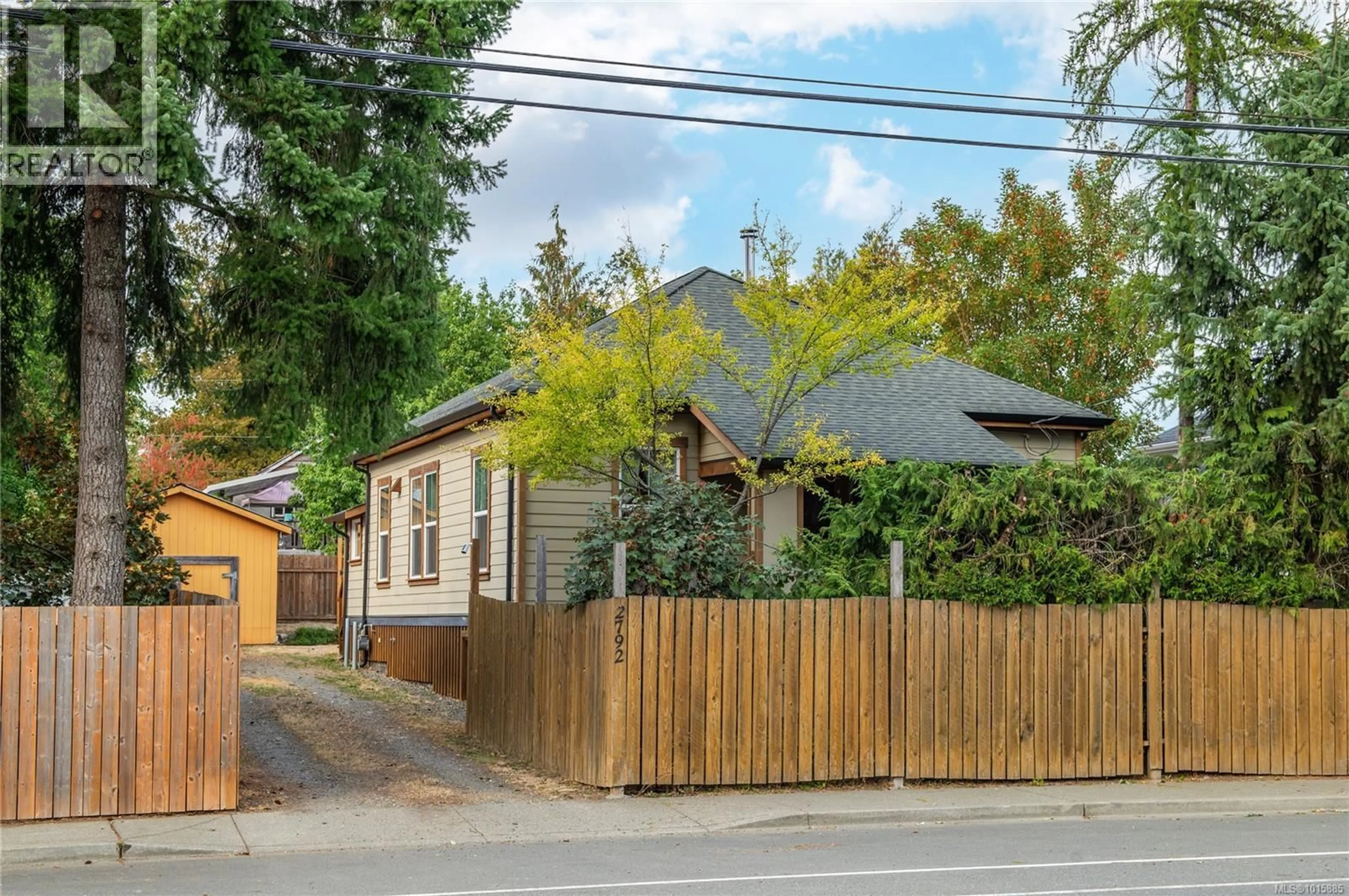 A pic from outside/outdoor area/front of a property/back of a property/a pic from drone, street for 2792 DUNSMUIR AVENUE, Cumberland British Columbia V0R1S0